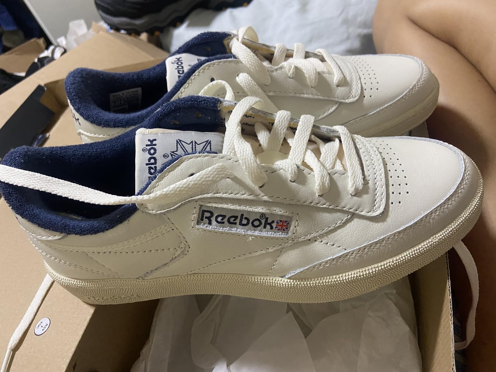 Close-up detail of Reebok Club C 85 Vintage leather construction and green logo