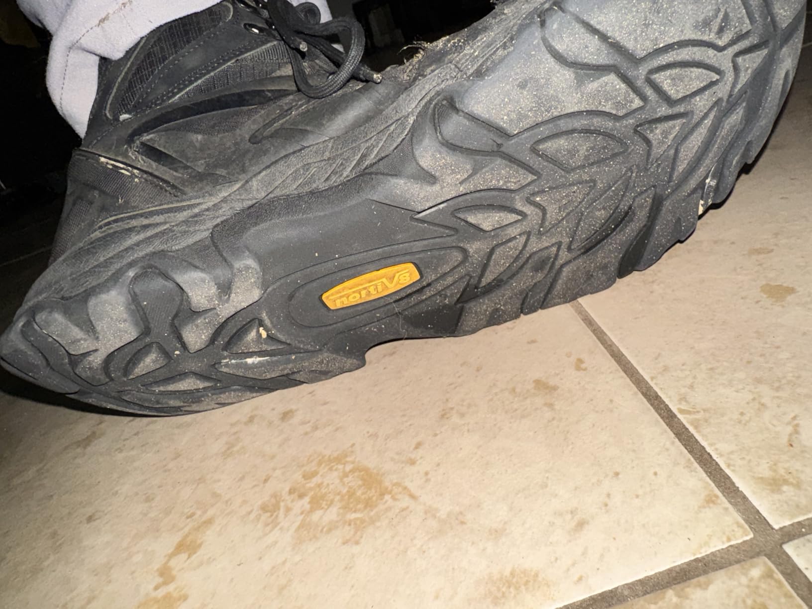 NORTIV 8 Armadillo boot rubber outsole showing 5mm lug pattern tread design for trail traction