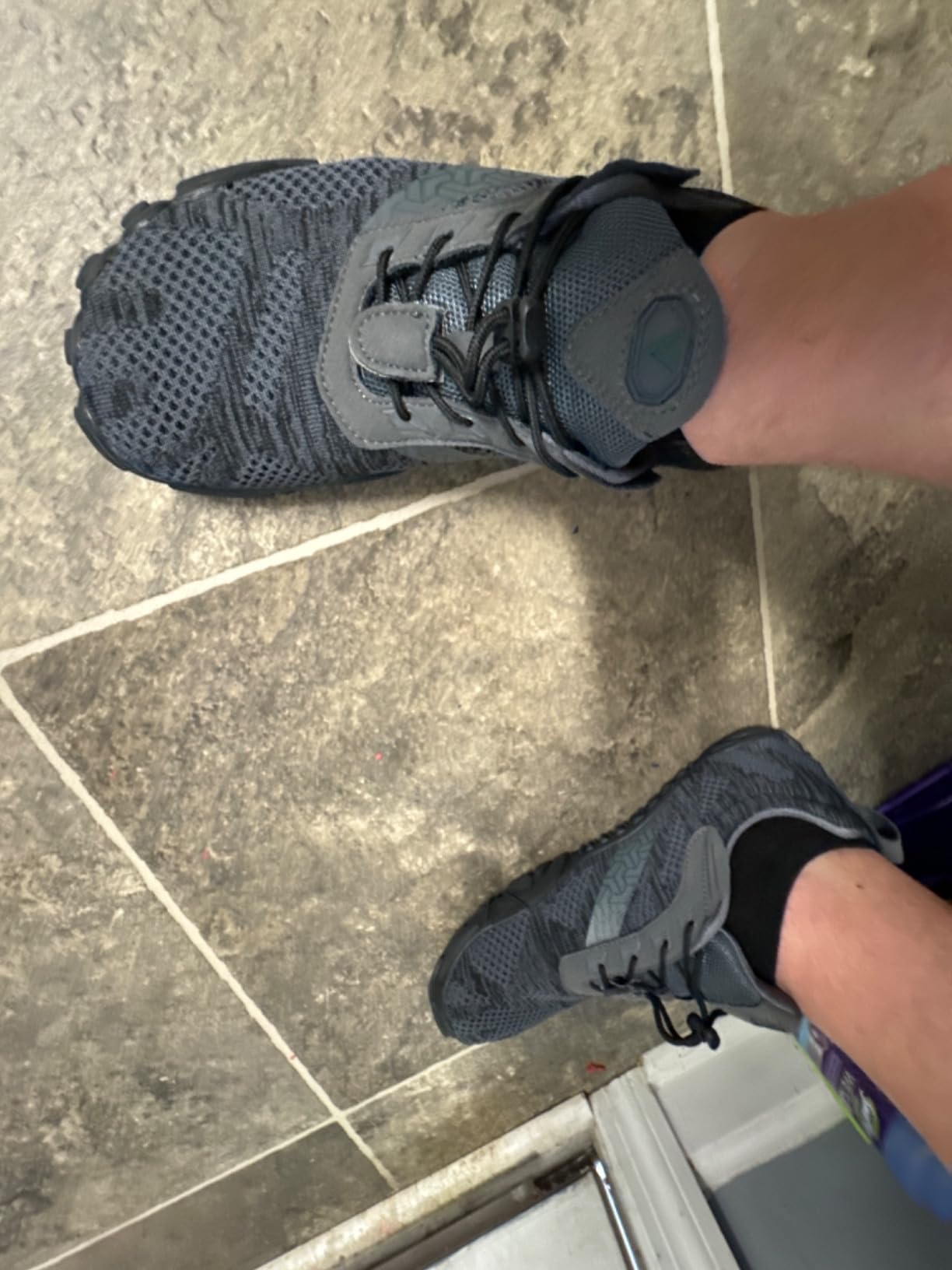 WHITIN Men's Minimalist Trail Running Shoes in black showing wide toe box and rubber tread pattern