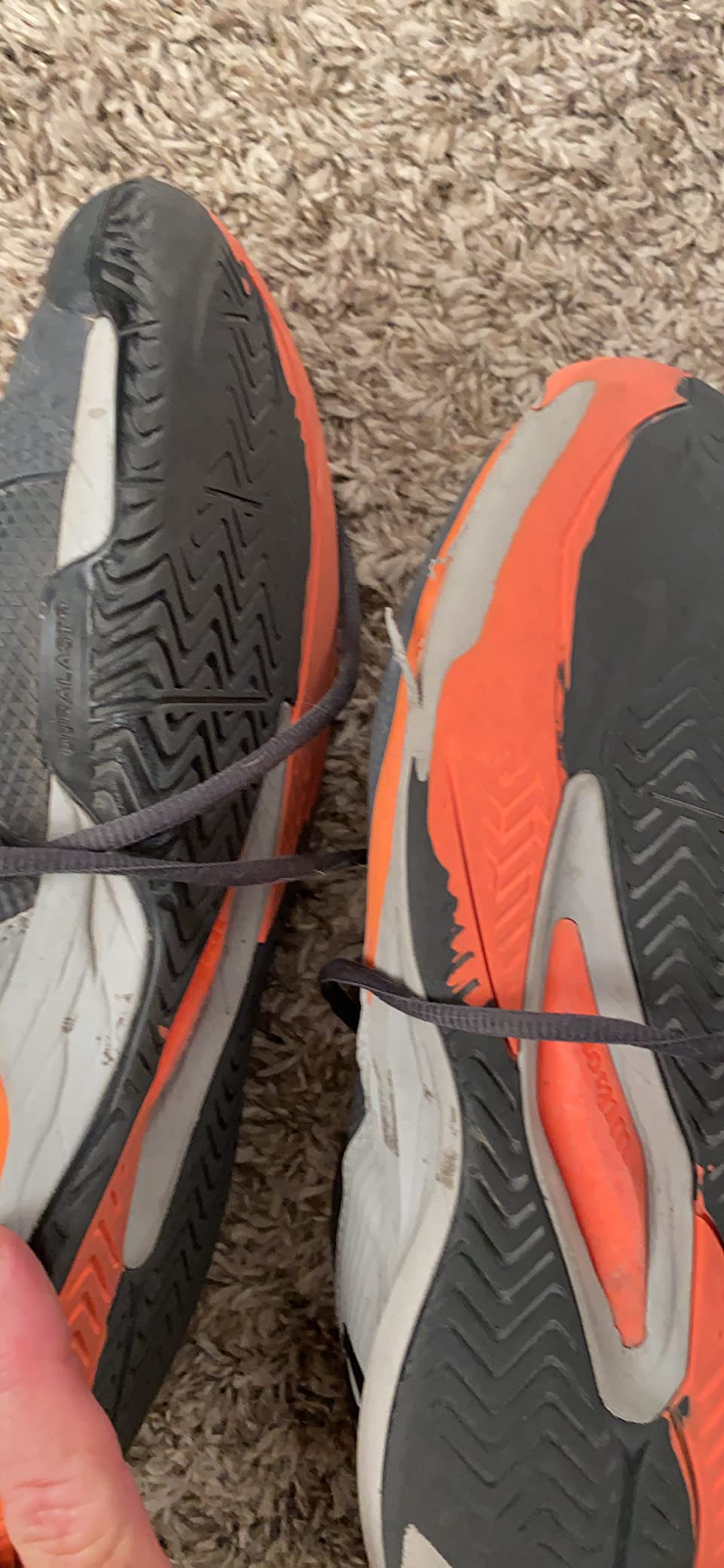 Wilson Rush Pro Ace outsole detail showing Duralast rubber compound and traction pattern design for court performance