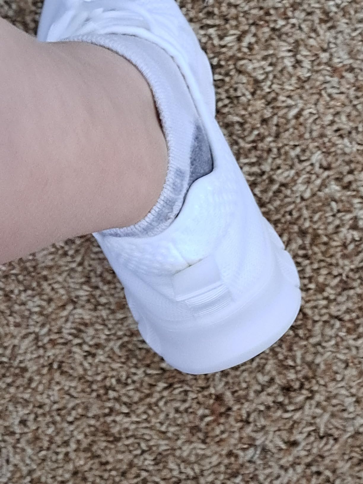 Side profile of GDEKLO women's sneakers showing lightweight mesh construction and slip-on design