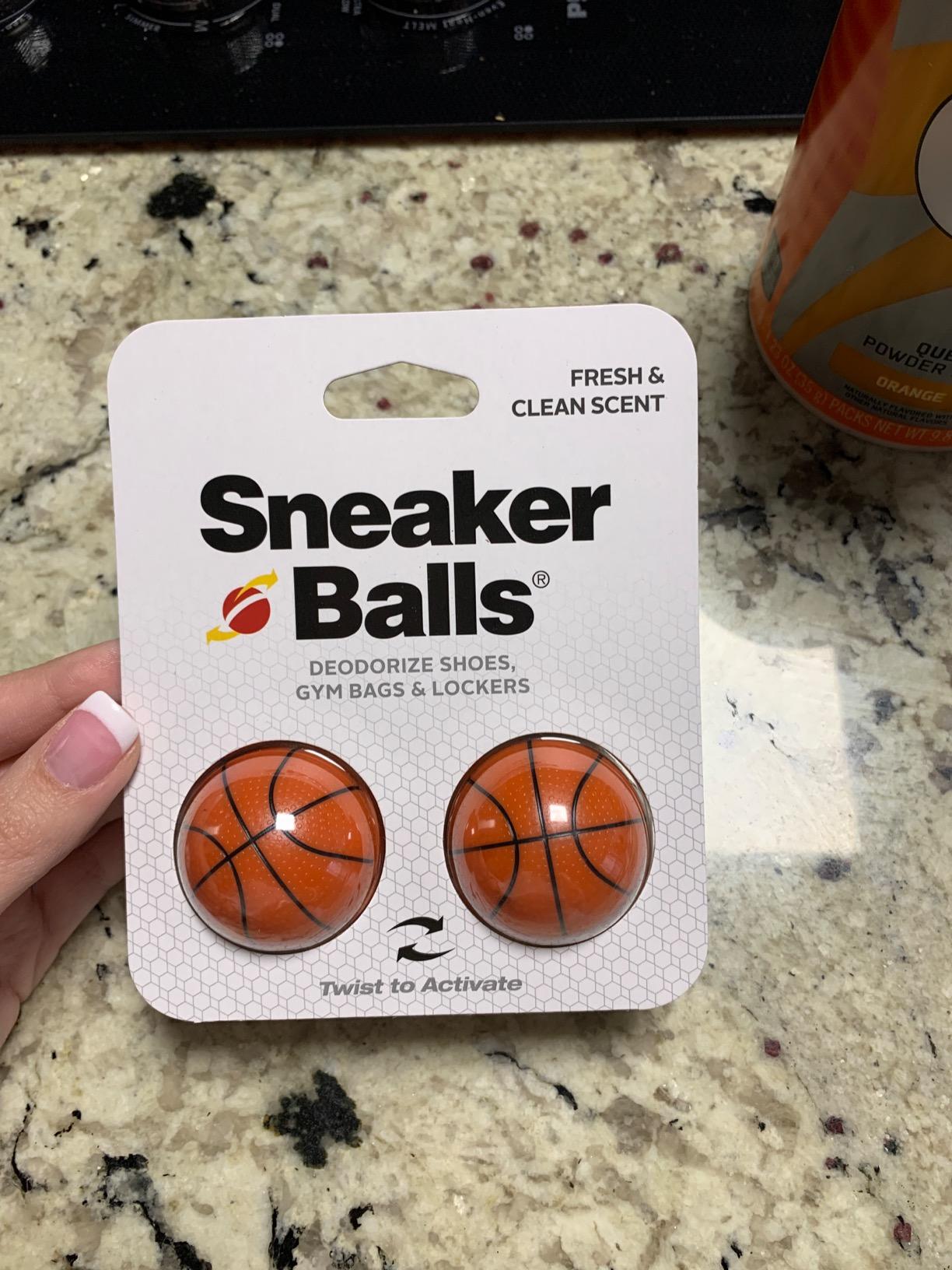 Sneaker balls placed inside basketball shoes showing proper usage and fit