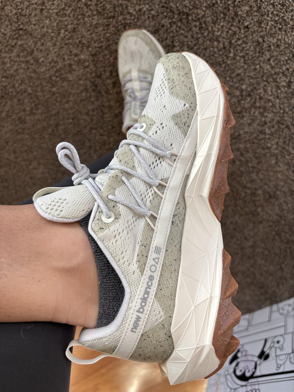 Side profile view of New Balance Tektrel V1 showing overall shoe design and proportions