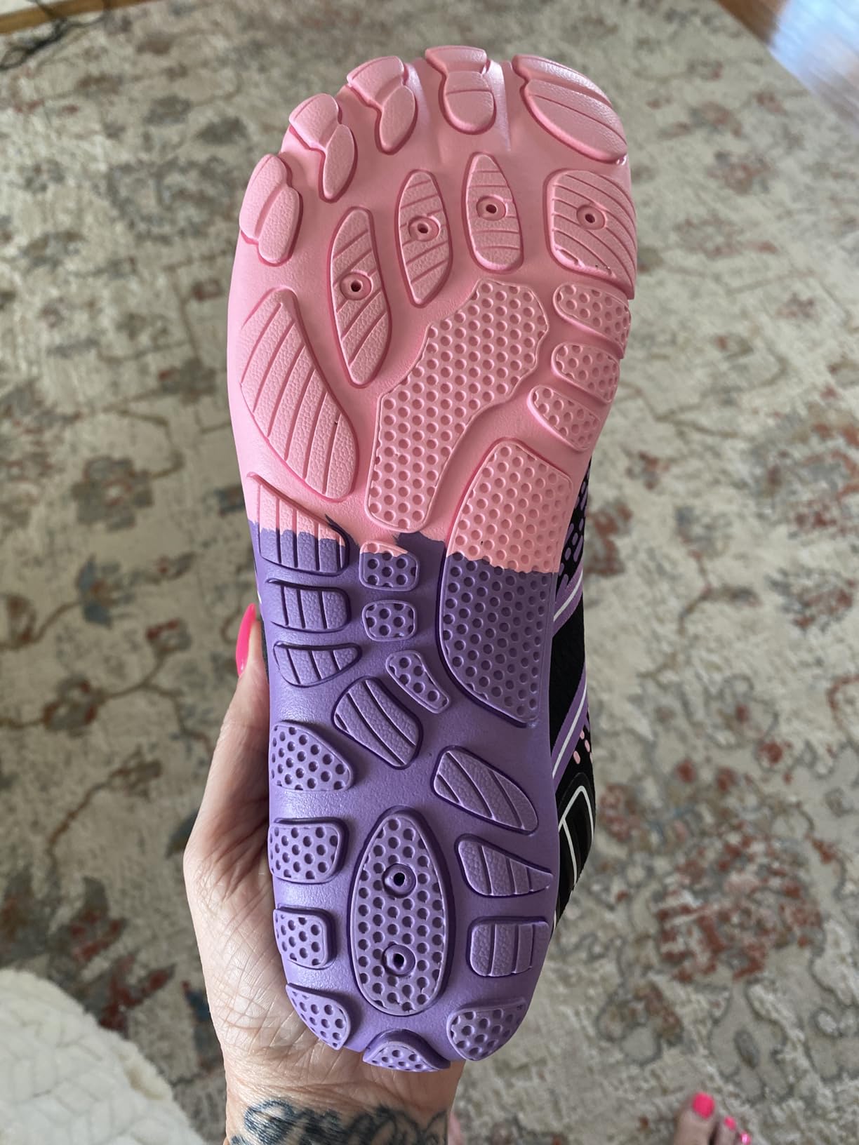 ATHMILE water shoes sole pattern showing 8 drainage holes and anti-slip traction design