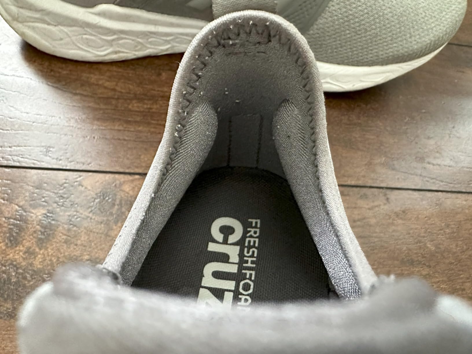 Close-up of New Balance Cruz V3 construction showing heathered mesh upper and Fresh Foam X midsole details