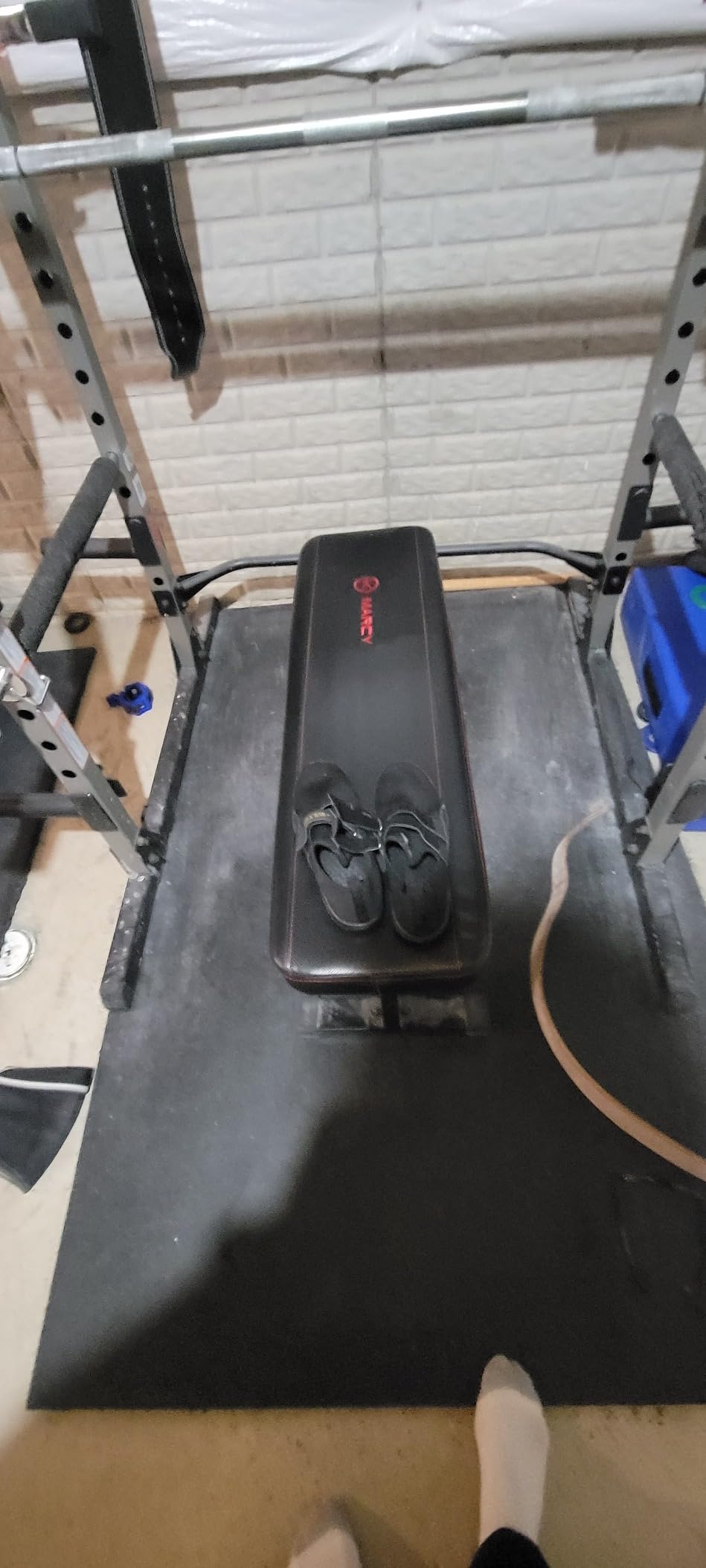 Fitness deadlift shoes during an active weight training session demonstrating excellent floor grip and stability on gym mats