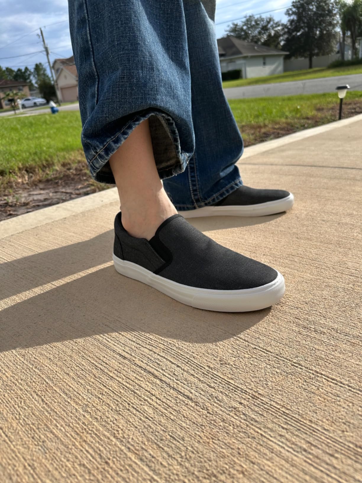 Men's Classic Low Top Slip-On Canvas Sneakers in olive colorway showing elastic side panels