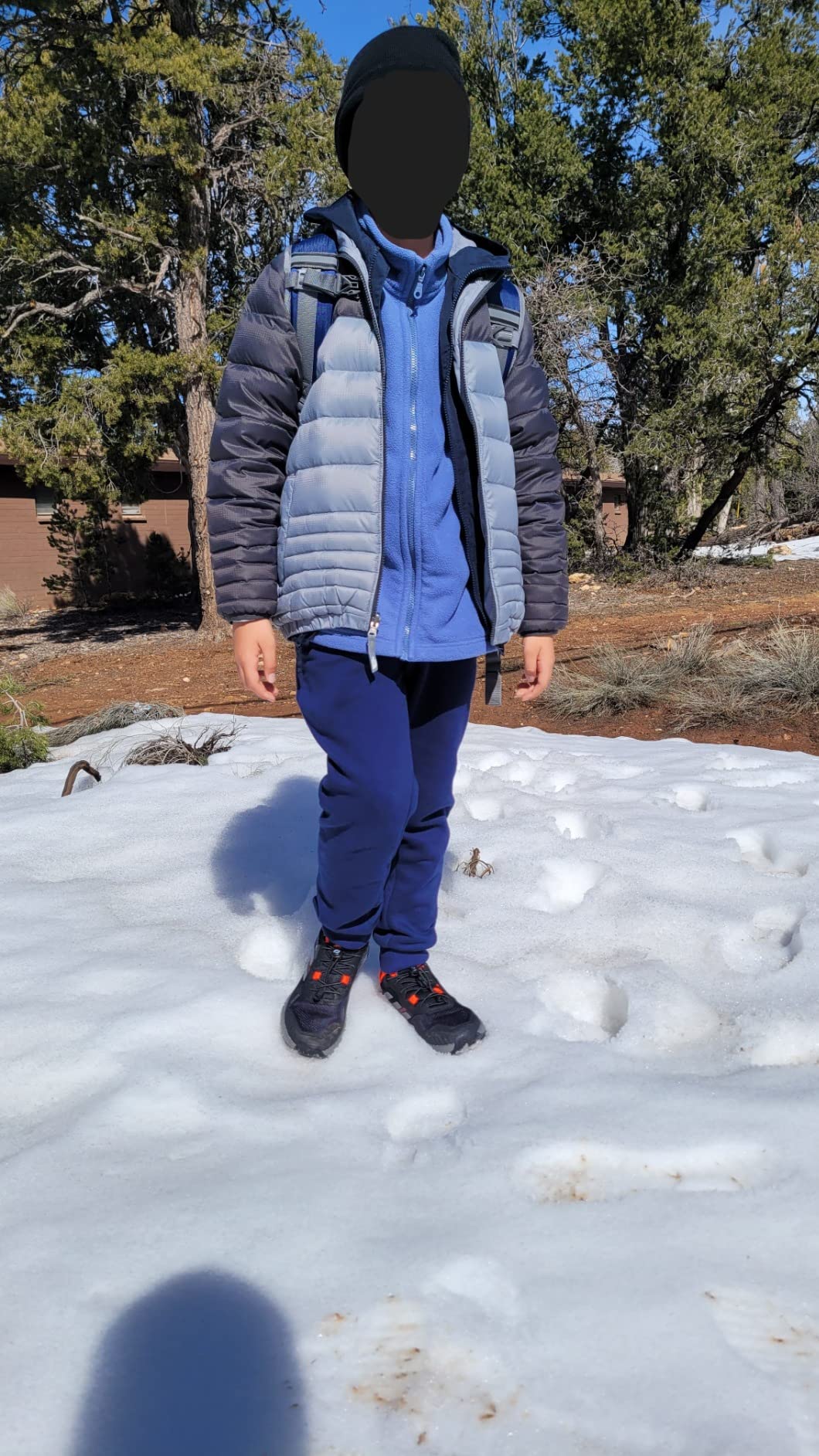 Close-up detail shot of Adidas Terrex Soulstride showing mesh upper construction and lacing system