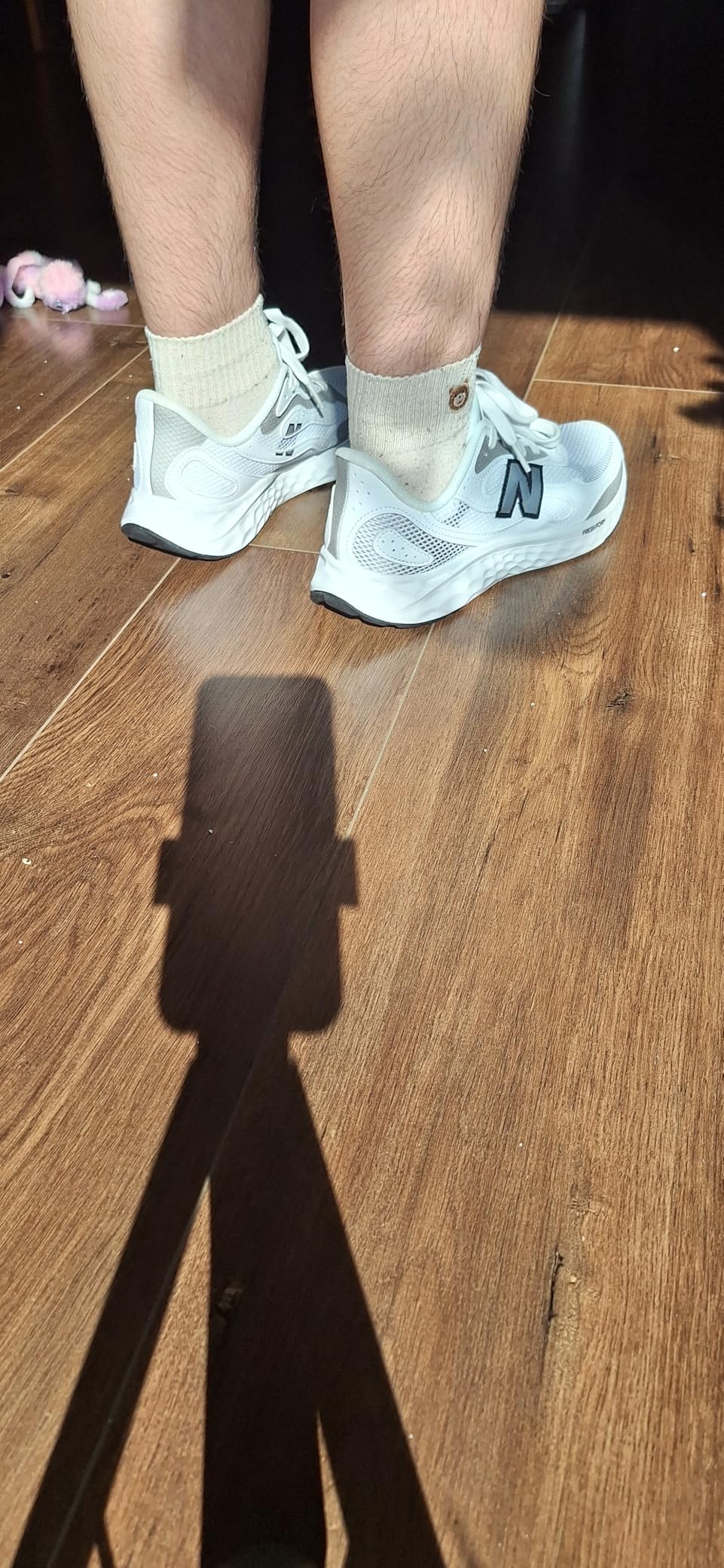 New Balance Arishi V4 Tiralux side profile view showing Fresh Foam midsole and mesh upper design