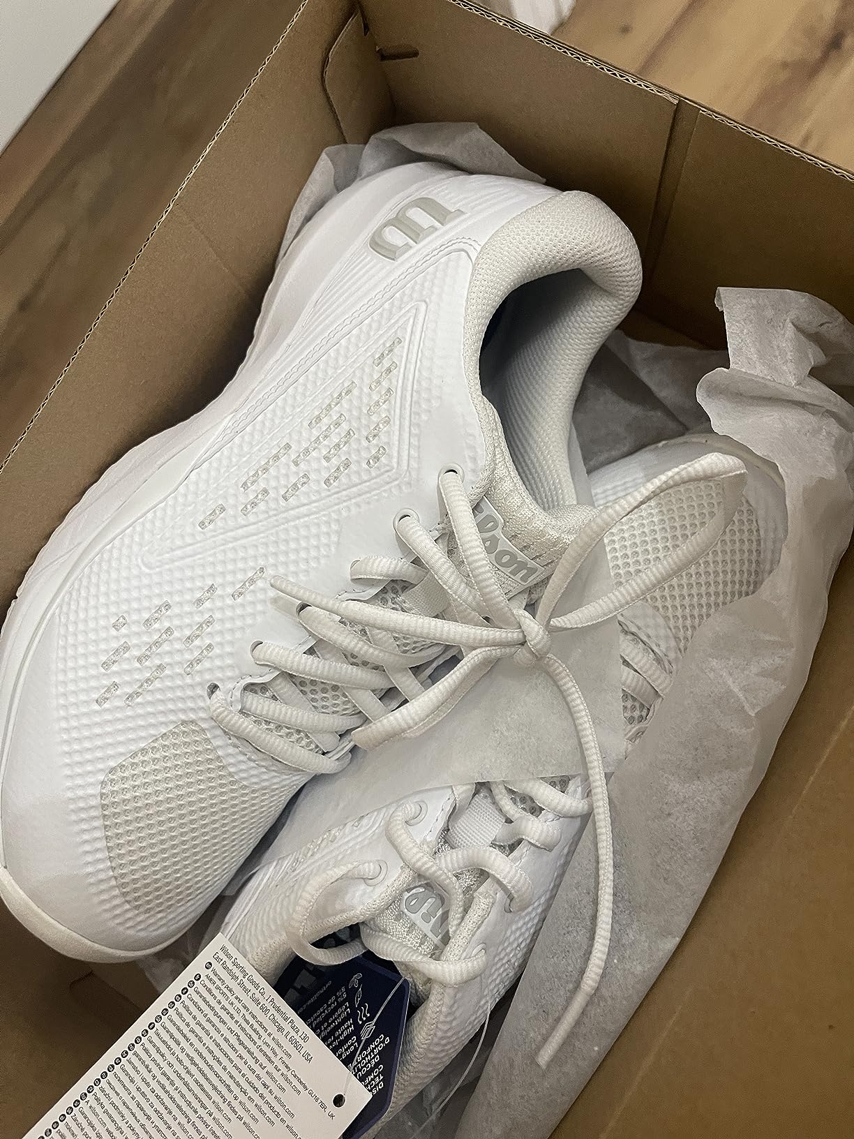 Wilson court shoes in action during pickleball session showing lateral stability and traction