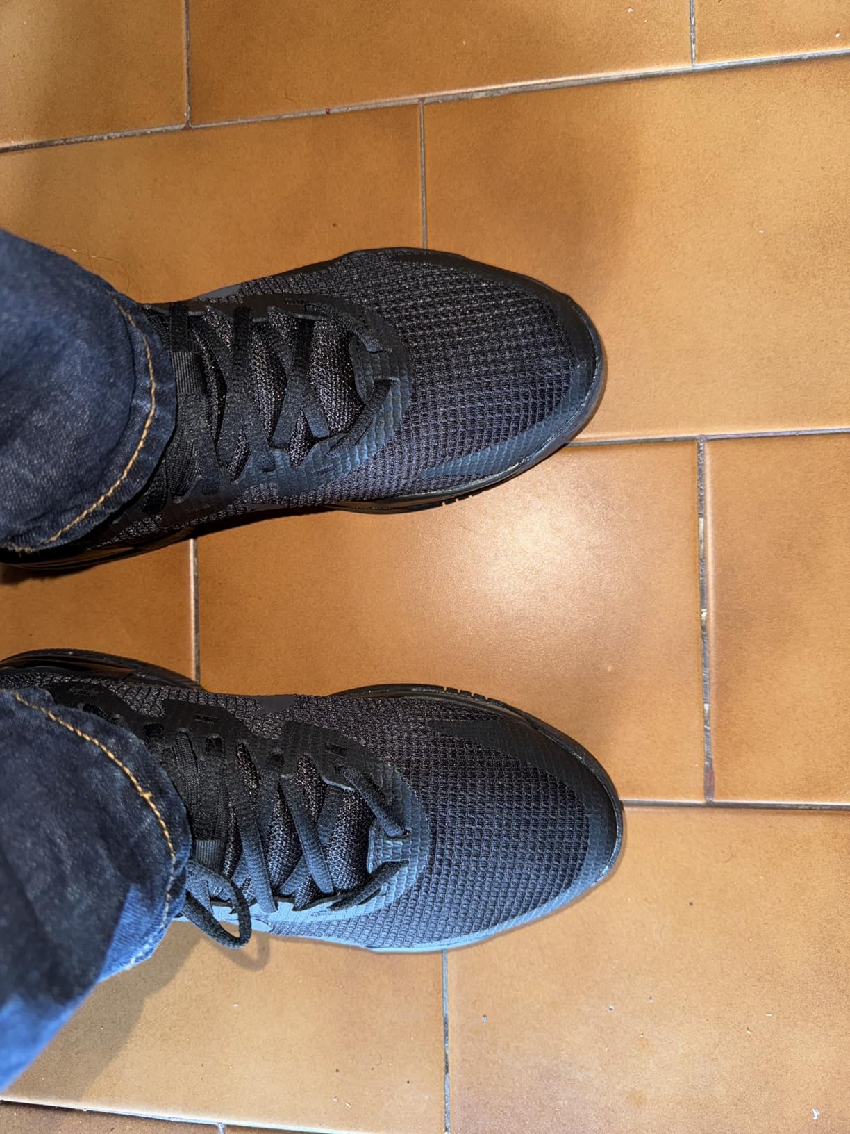 Nike Air Max Alpha side profile showing mesh breathability panels and padded ankle support design