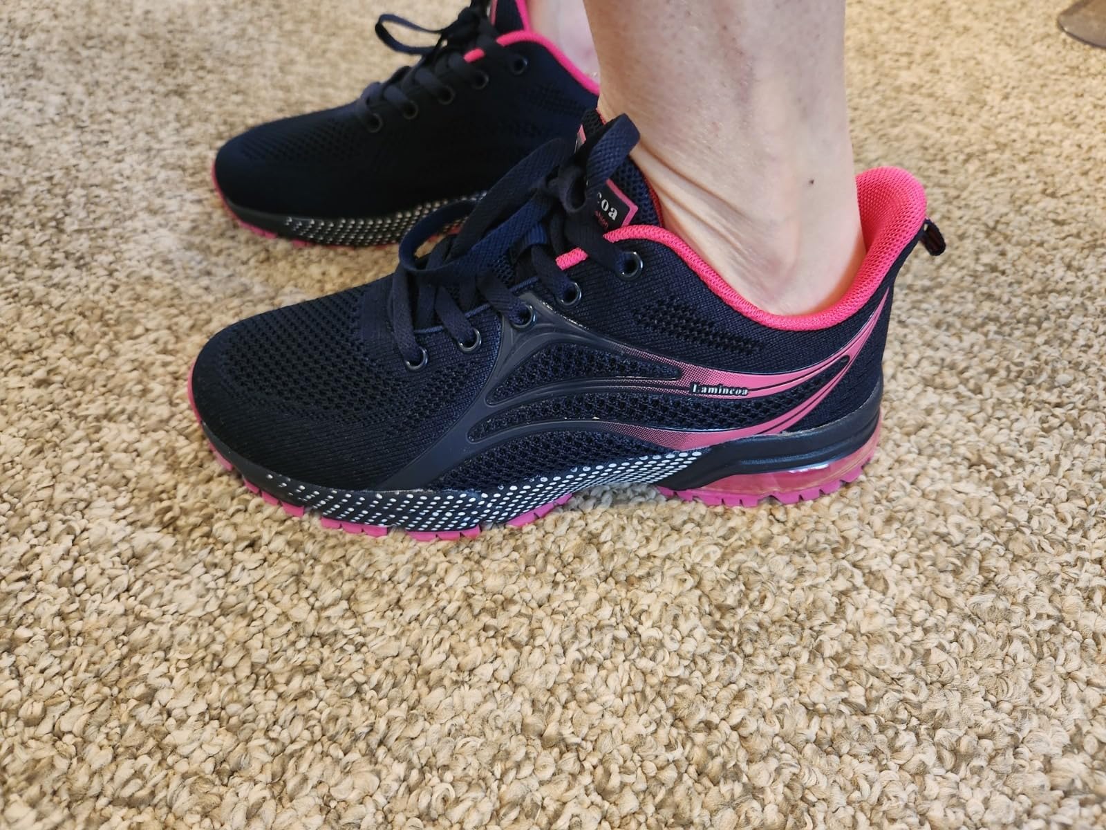 ZOOMCO sneakers in black and pink colorway showing versatile design suitable for multiple activities
