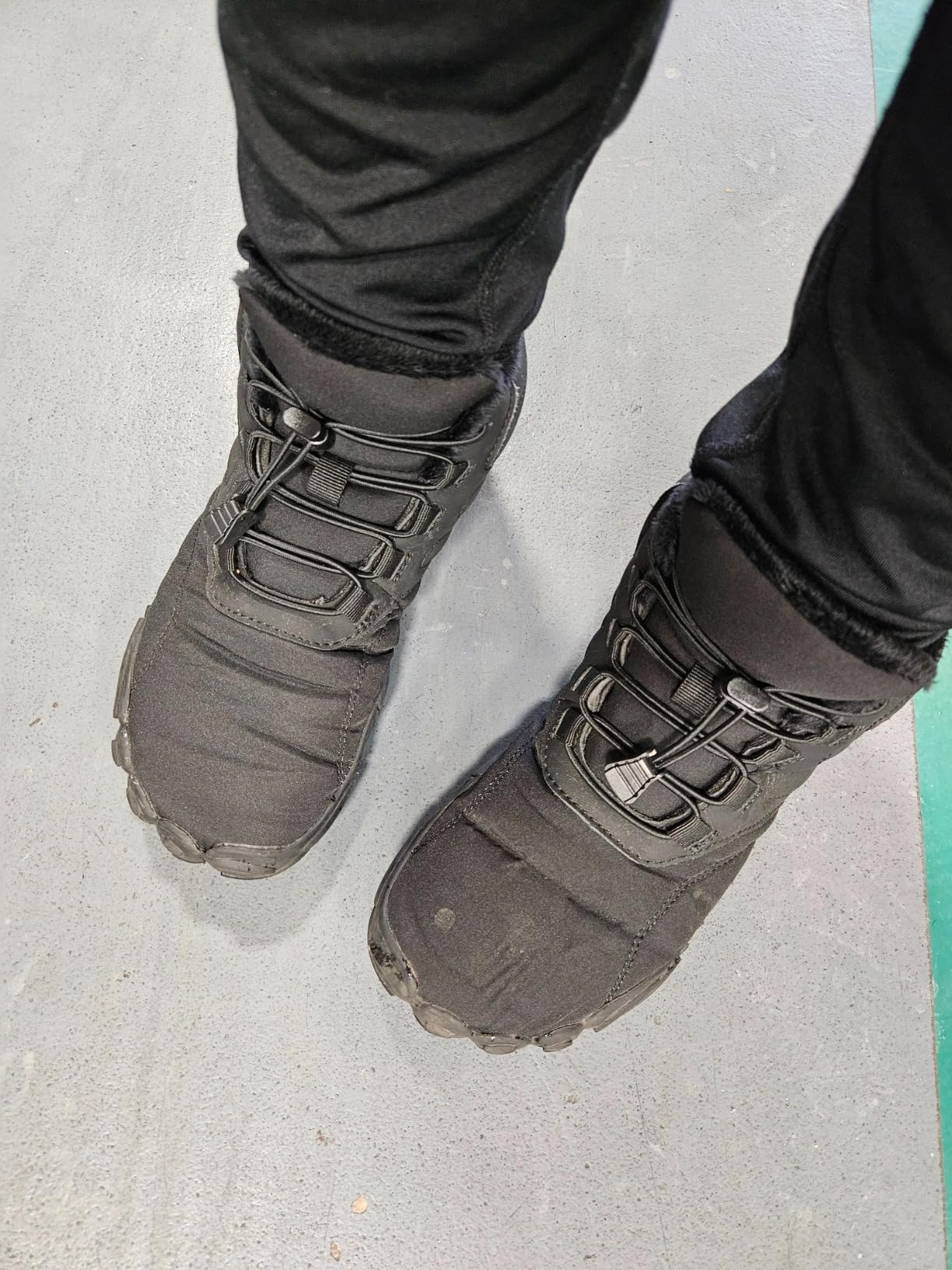 Winter Hike Barefoot Boots on snowy trail during testing