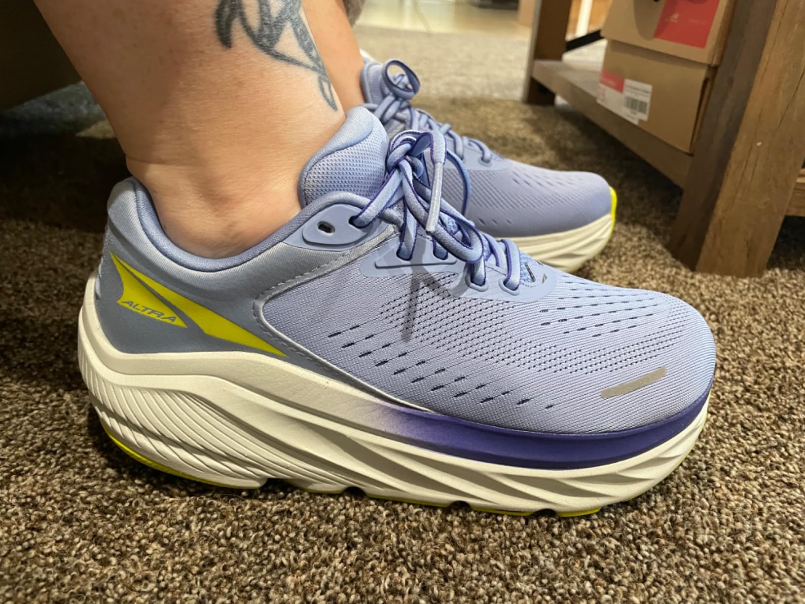 Altra Via Olympus 2 outsole showing FootPod technology and limited rubber coverage with exposed foam