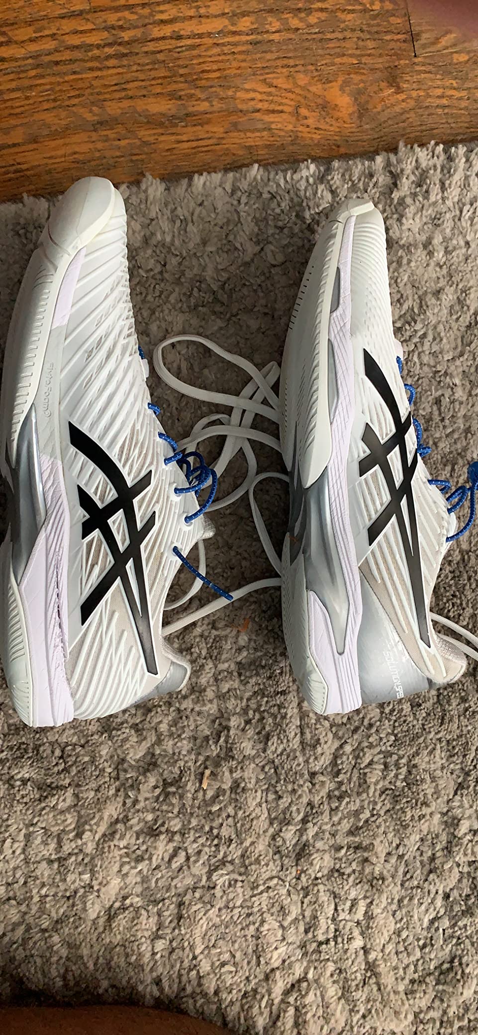 ASICS Solution Speed FF 2 showing wear pattern after extensive court testing