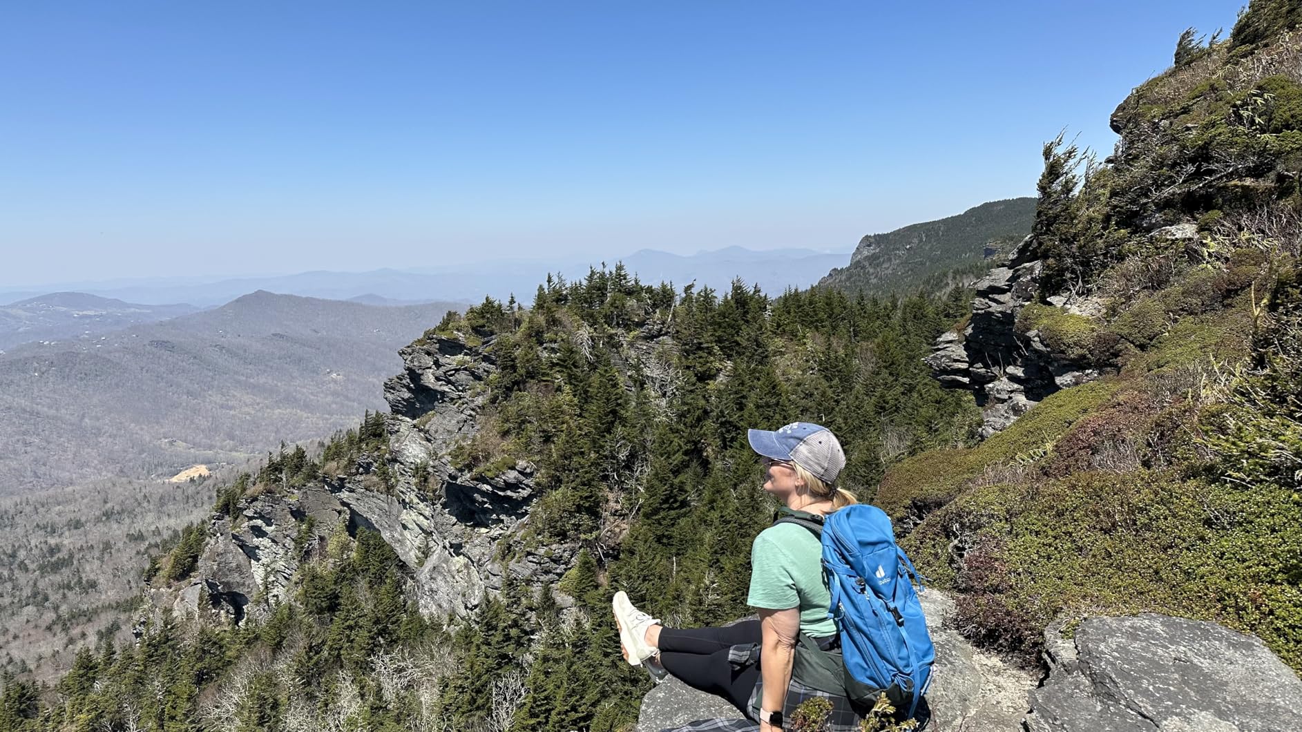 New Balance Tektrel V1 in action on trail terrain showing AT Tread outsole pattern gripping rocky surface
