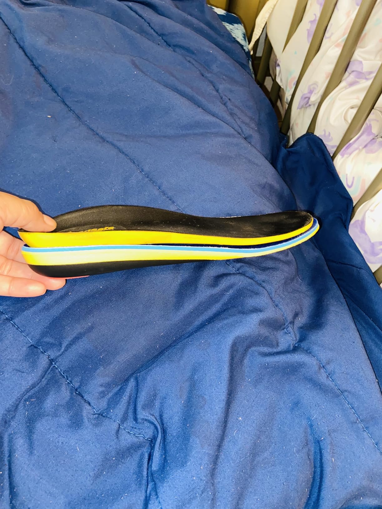 Close-up view of VALSOLE orthotic insole arch support curve and deep U-shaped heel cup