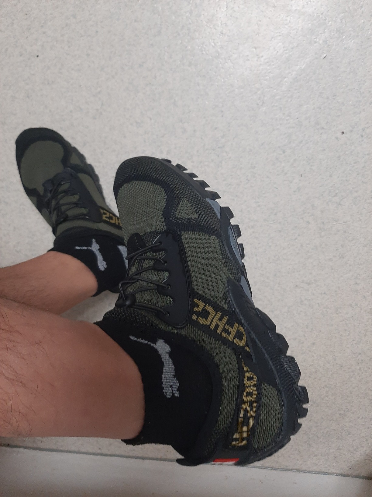 ABAO Hiking Shoes demonstrating grip capabilities on rocky terrain