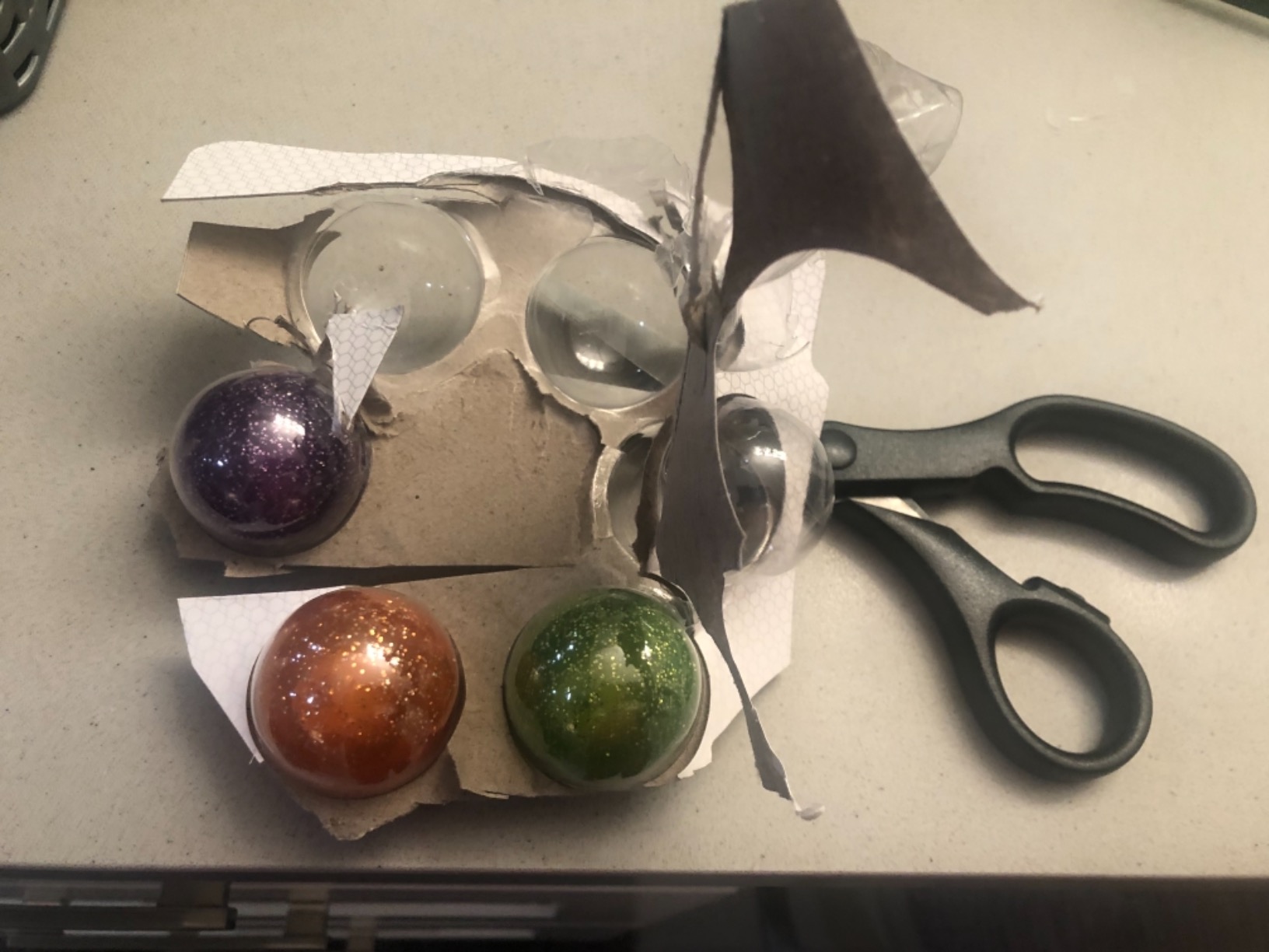 Sof Sole Sneaker Balls placed inside athletic shoes demonstrating real-world usage and compact fit