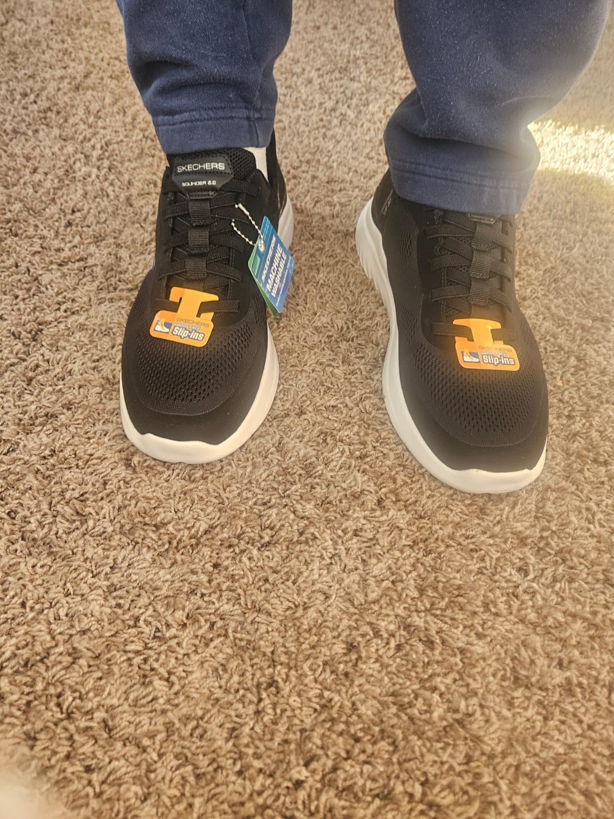 Skechers Men's Bounder 2.0 Emerged slip-in sneaker in grey colorway showing hands-free Heel Pillow design