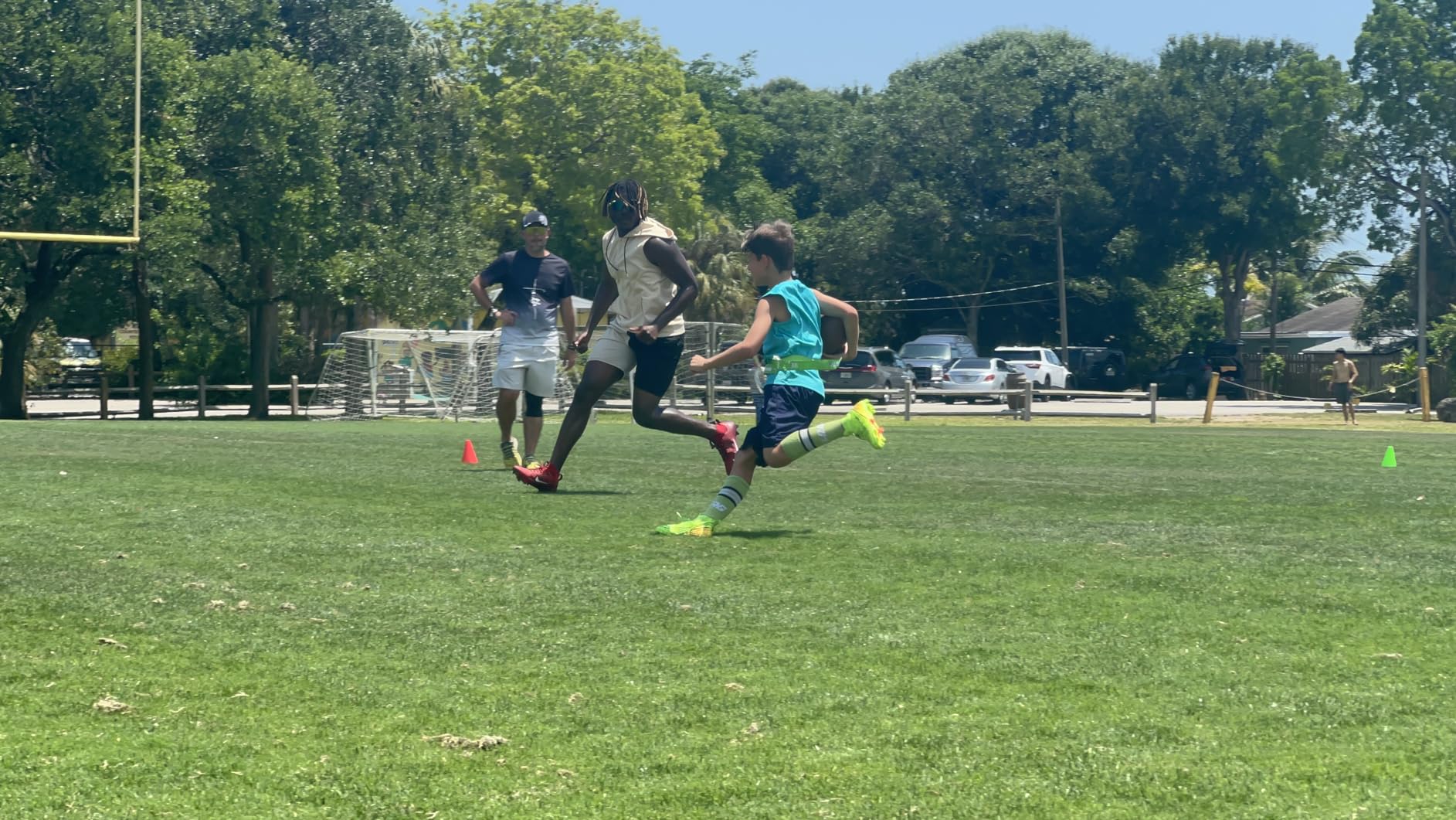 Soccer cleats showing detailed spike pattern and outsole design