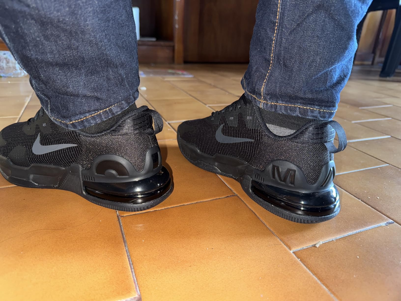 Nike Air Max Alpha heel view showing Air Max cushioning technology unit and Nike branding details