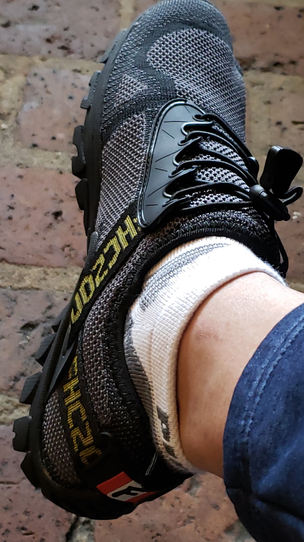 Close-up detail view of ABAO Hiking Shoes mesh upper construction and elastic lacing system