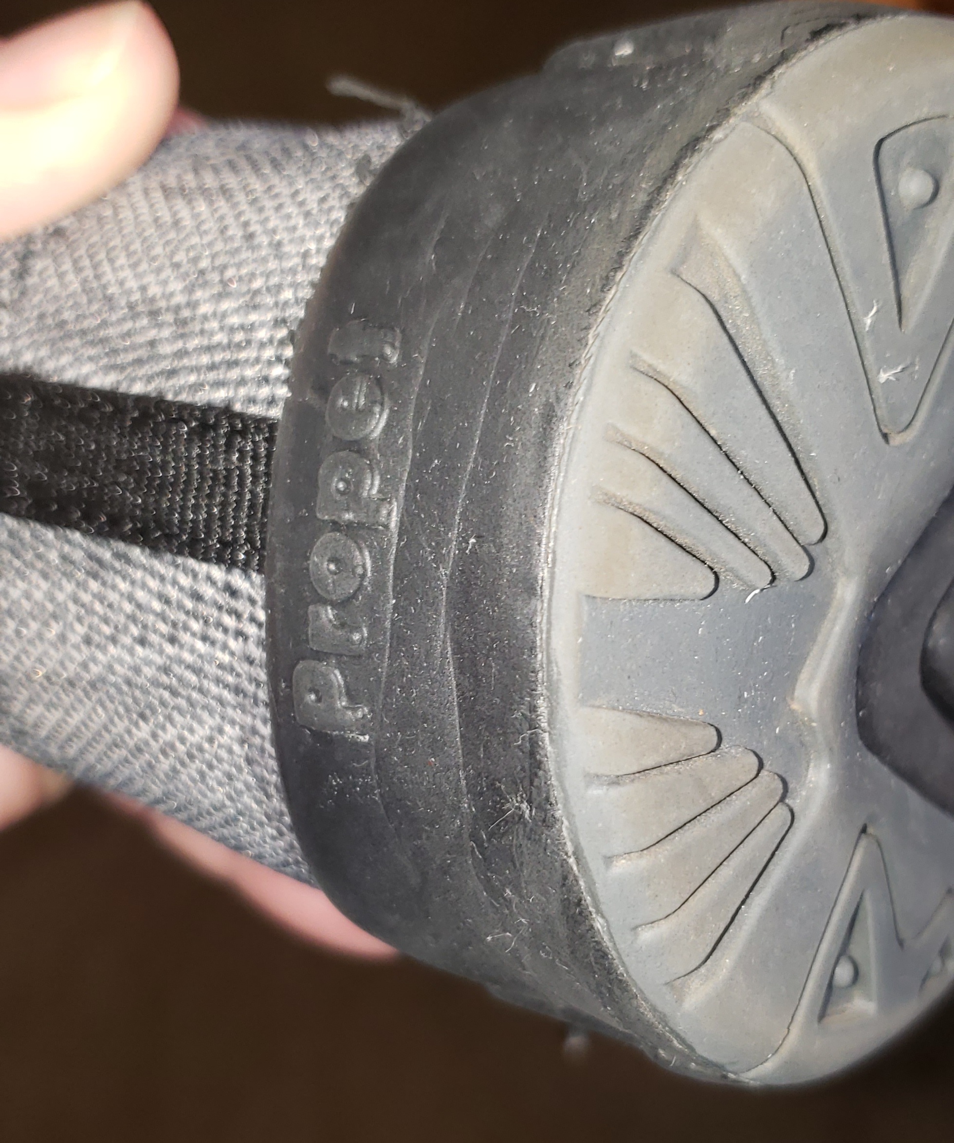 Propét Stability Fly quality control inconsistency showing surface debris visible on new shoe arrival