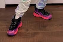 LackBlue kids sneakers on playground surface showing non-slip outsole in use