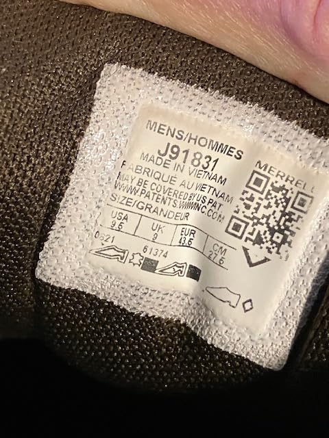 Side profile of Merrell Moab Adventure Lace showing ankle height and hiking shoe silhouette