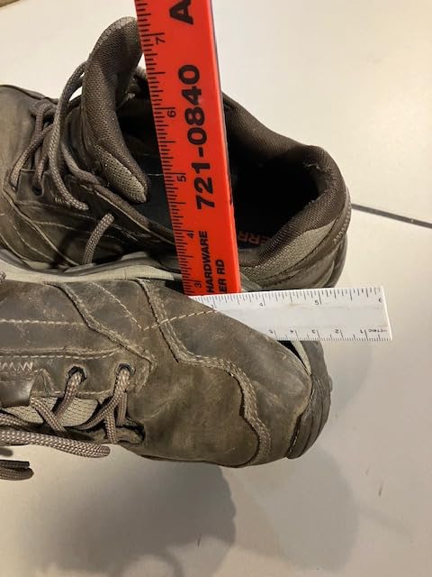 Merrell Moab Adventure Lace Vibram sole pattern showing aggressive tread lugs designed for multi-terrain traction