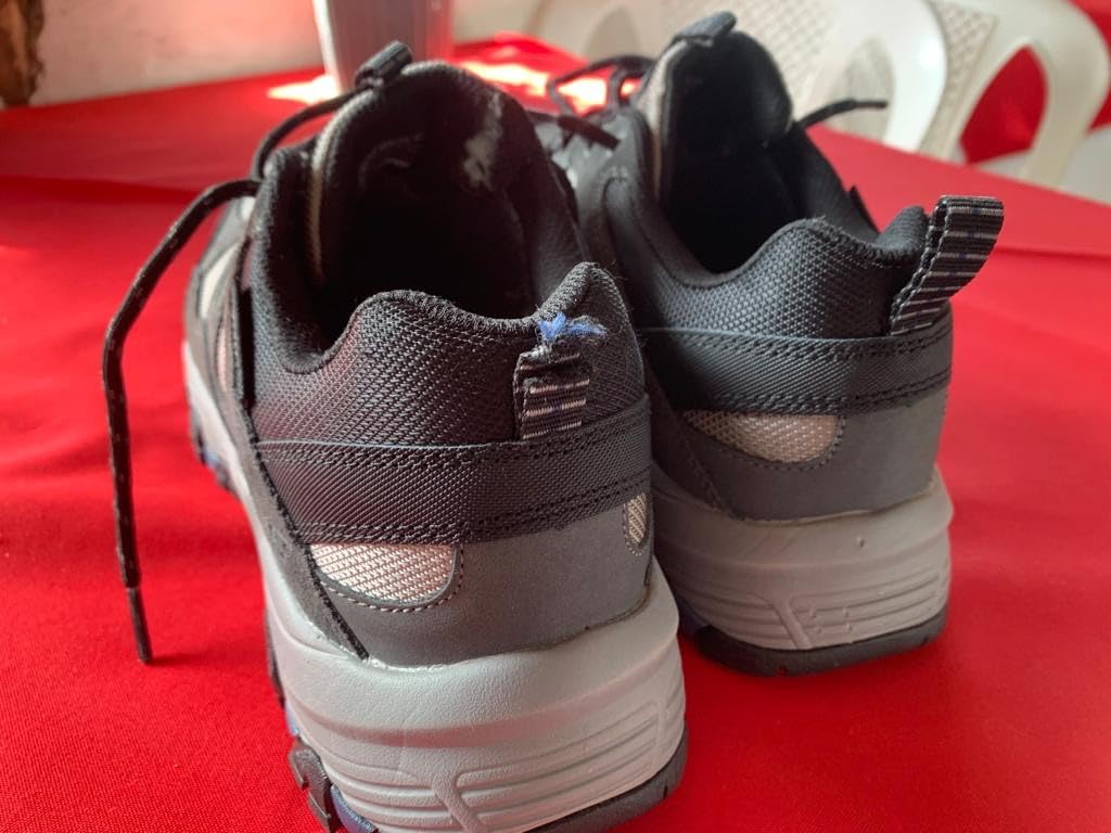 Detail view of Skechers Selmen-Enago construction quality showing stitching, waterproof treatment, and design elements