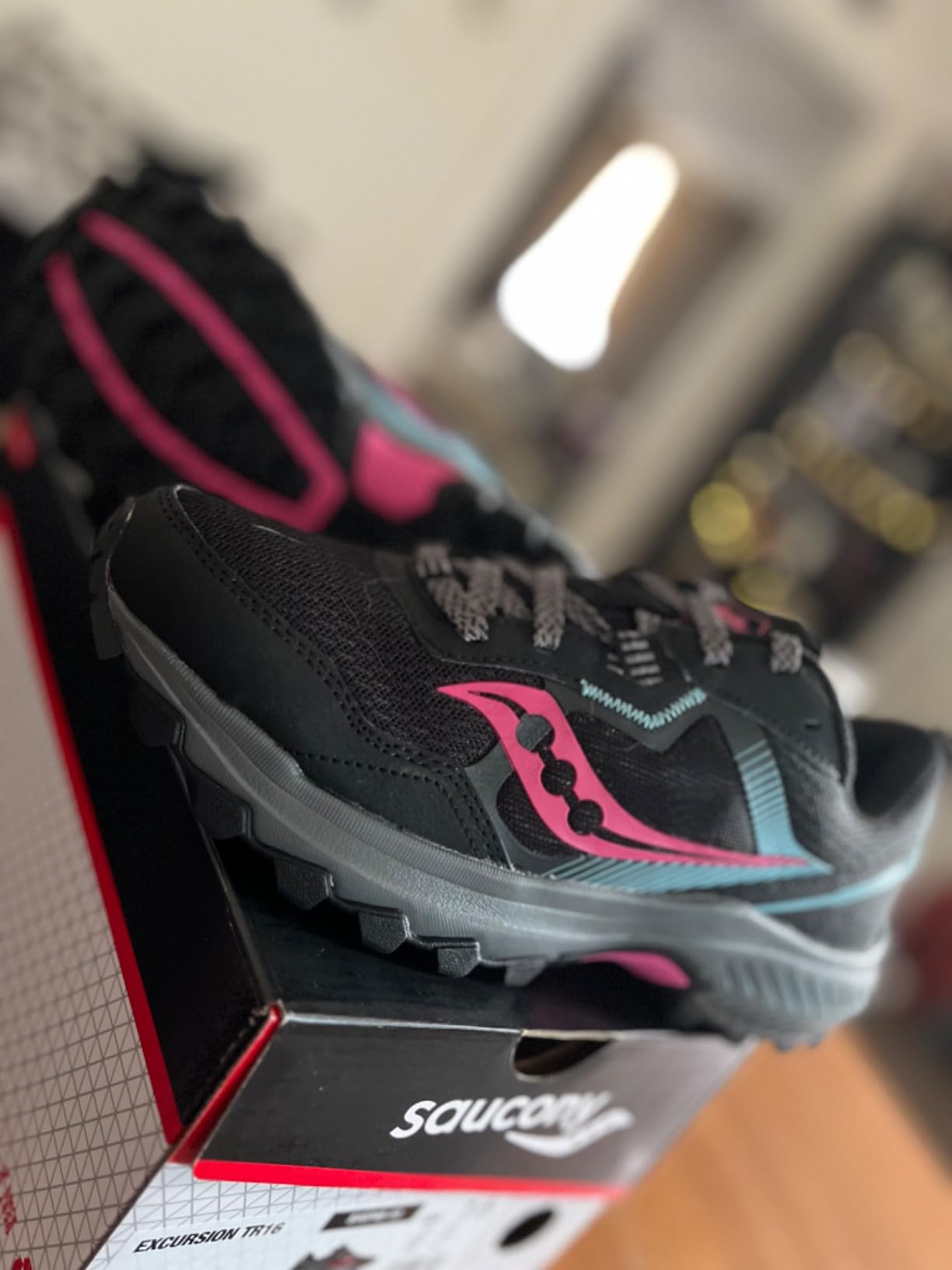 Side profile view of Saucony Excursion TR16 showing shoe height and silhouette