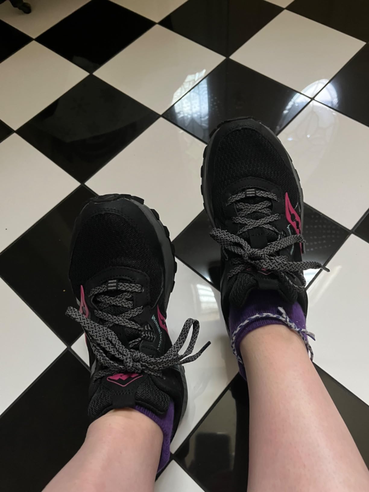 Bottom view of Saucony Excursion TR16 showing carbon rubber lug pattern and 4.5mm tread depth