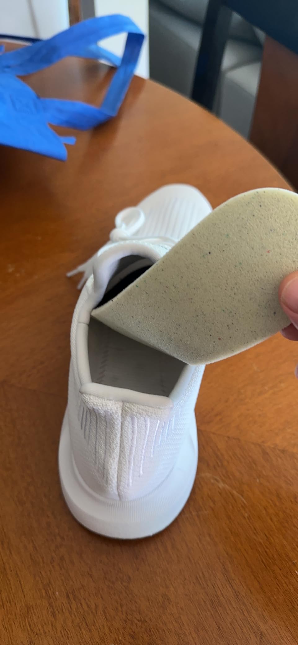 Adidas Swift Run Legacy Sneaker final product shot showing brand detailing and overall silhouette