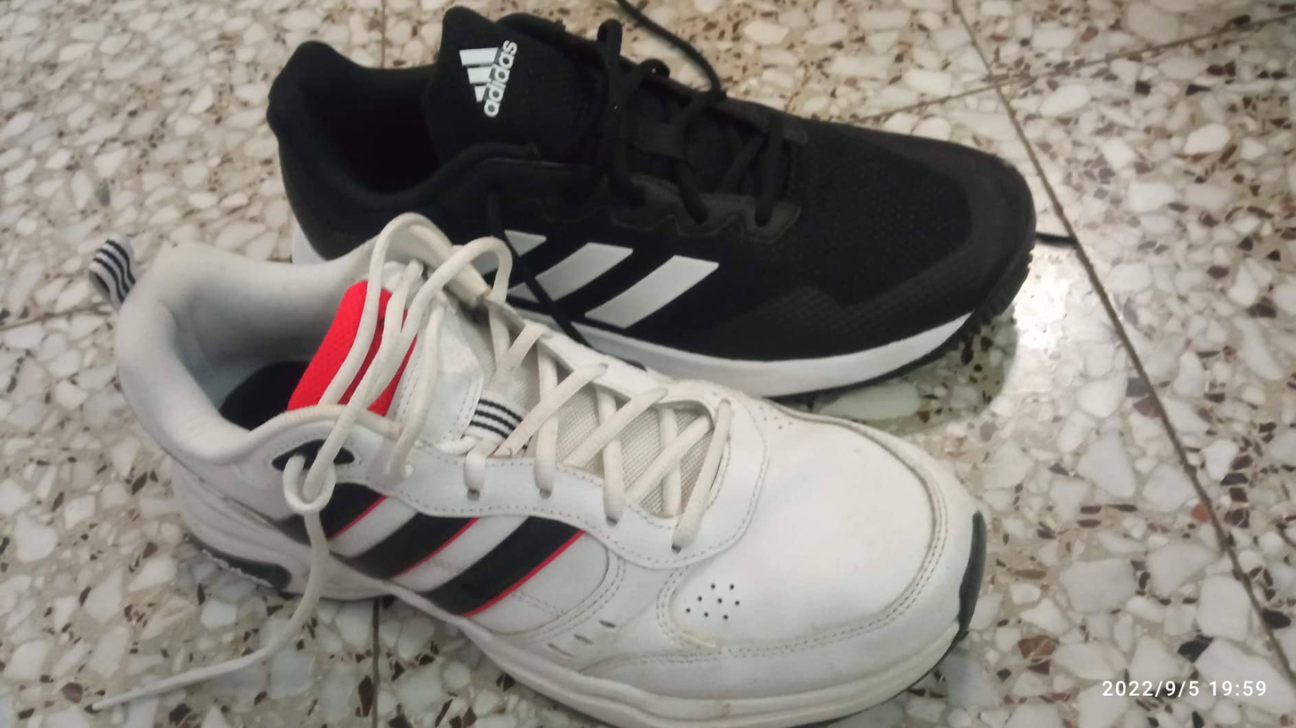 Adidas Gamecourt M tennis shoe in action during court play showing real-world lateral movement