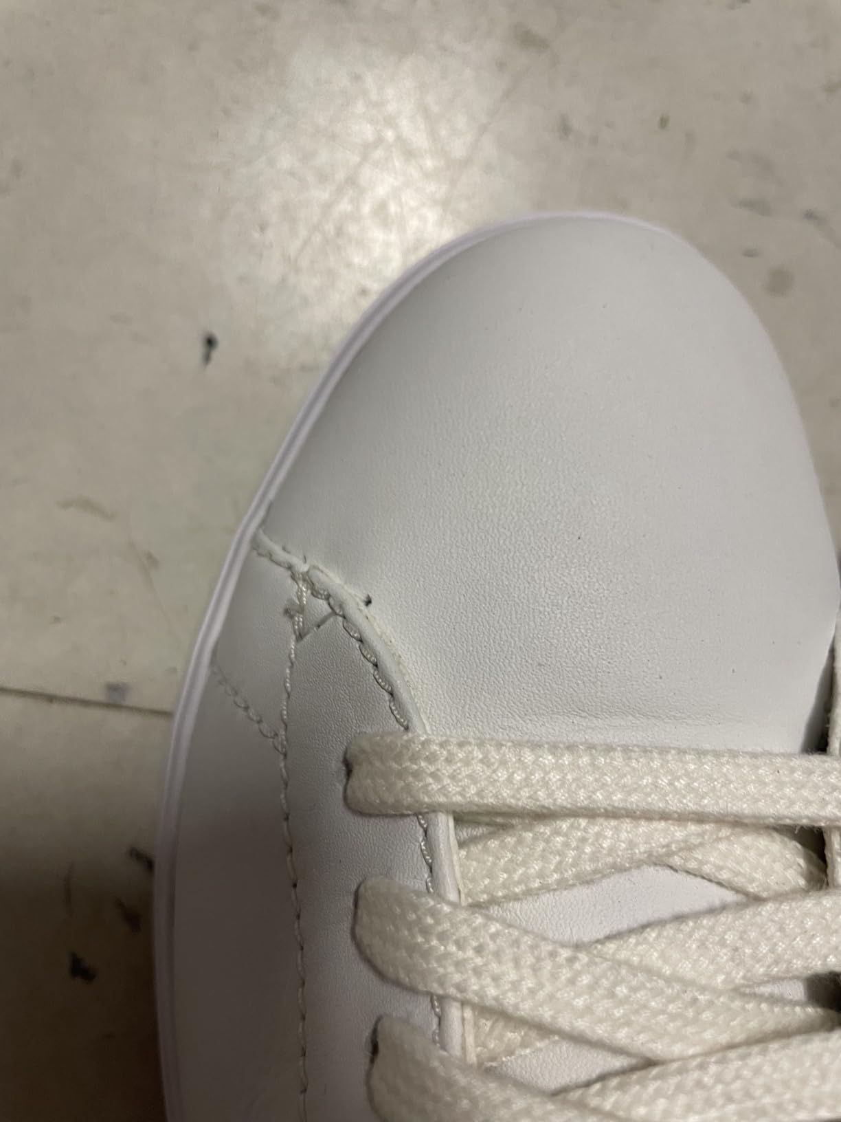 Cole Haan Grand Crosscourt showing stitching detail and construction quality