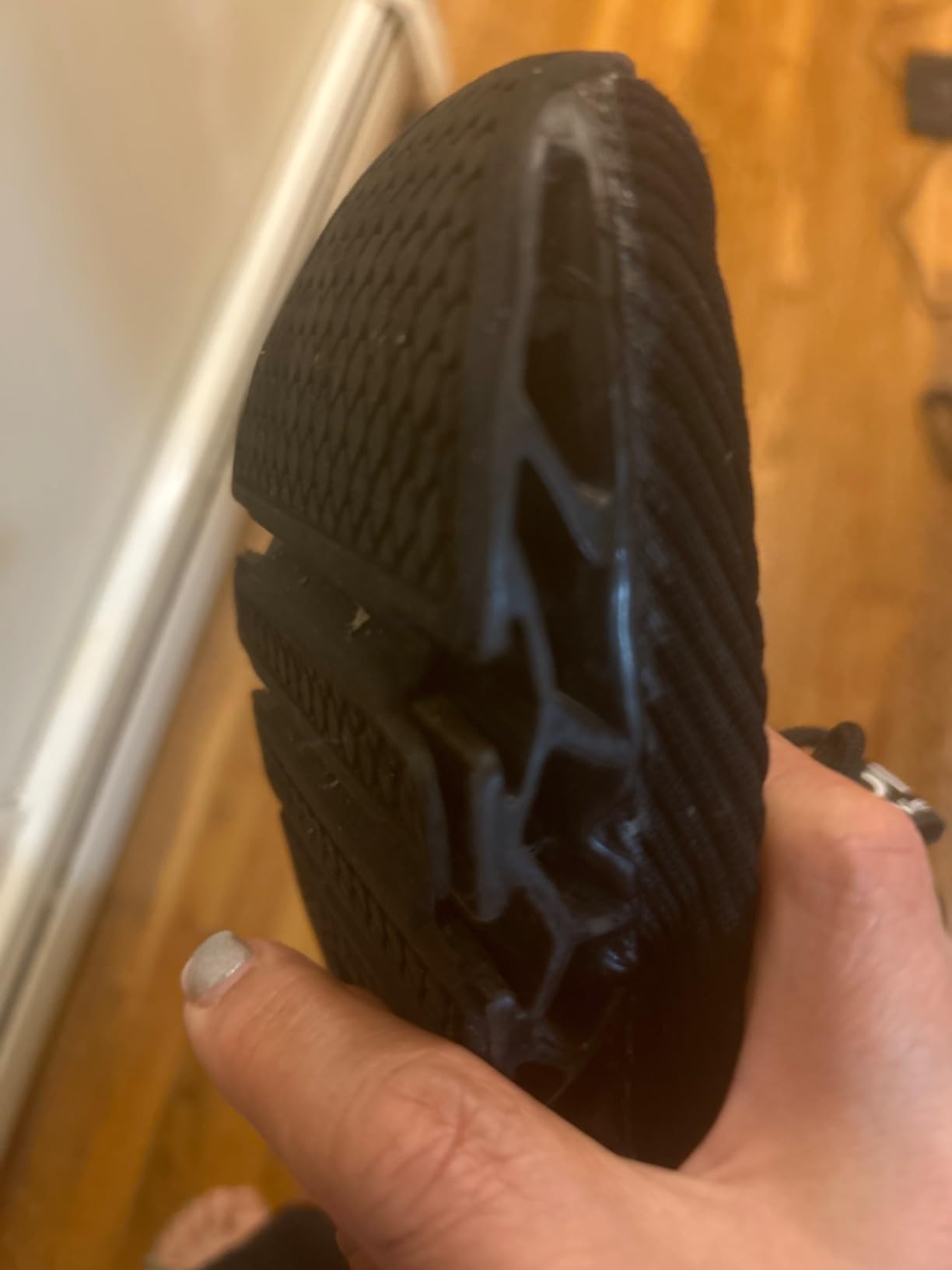 Durability wear pattern on TSIODFO sneakers showing sole stress signs after extended use