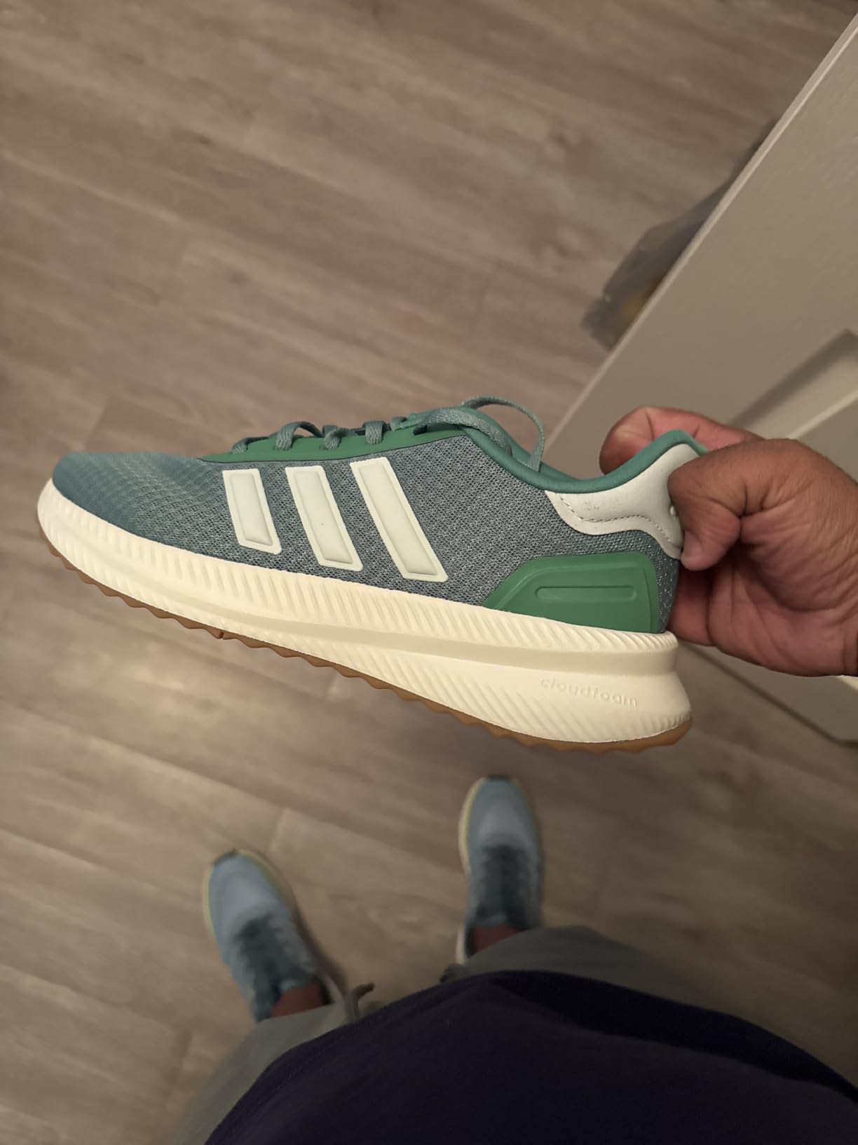 Close-up of Adidas X_PLR Path mesh upper construction and synthetic overlay detailing