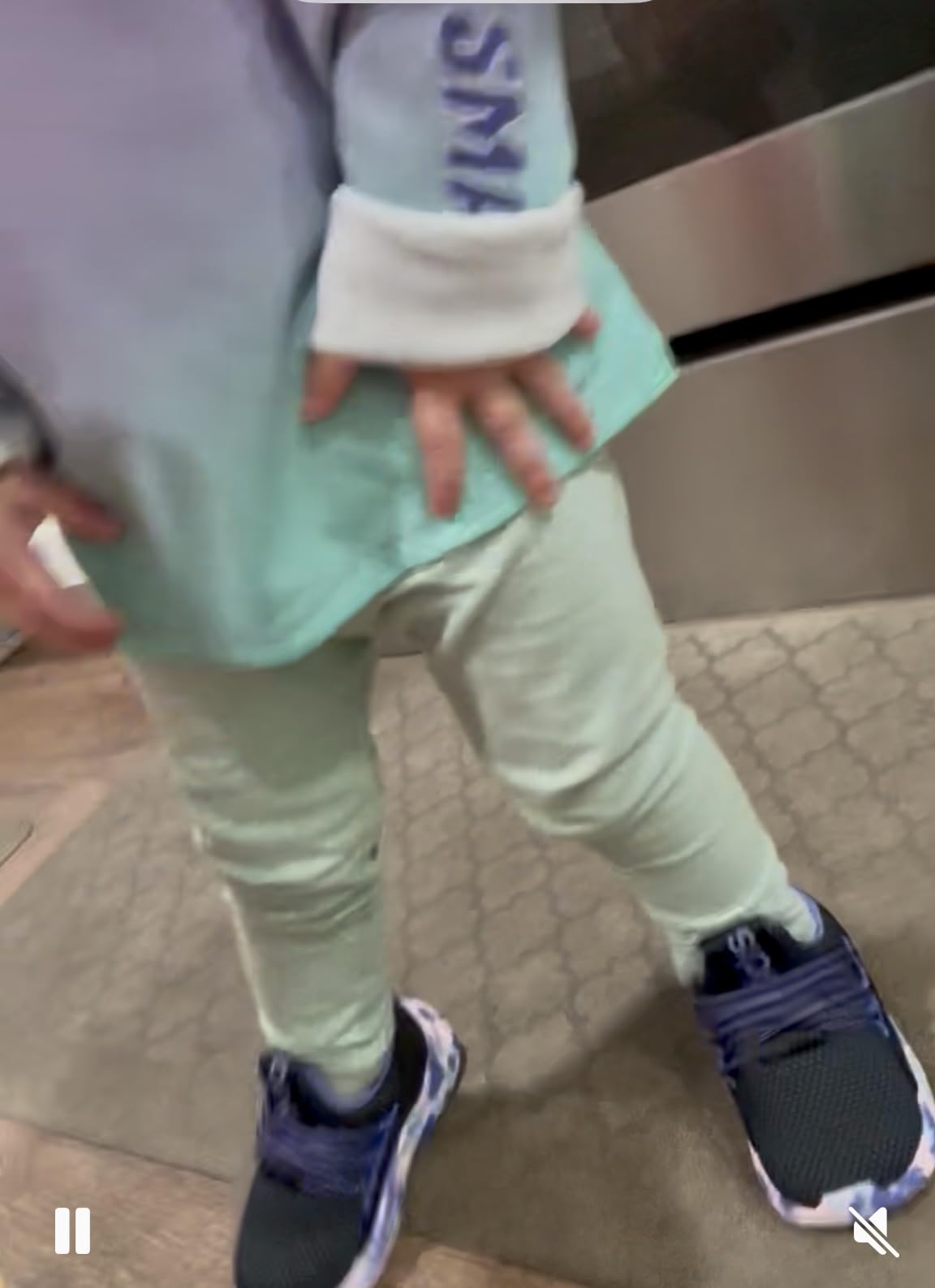 Young child wearing Adidas Lite Racer Adapt 7.0 showing real-world fit for toddlers