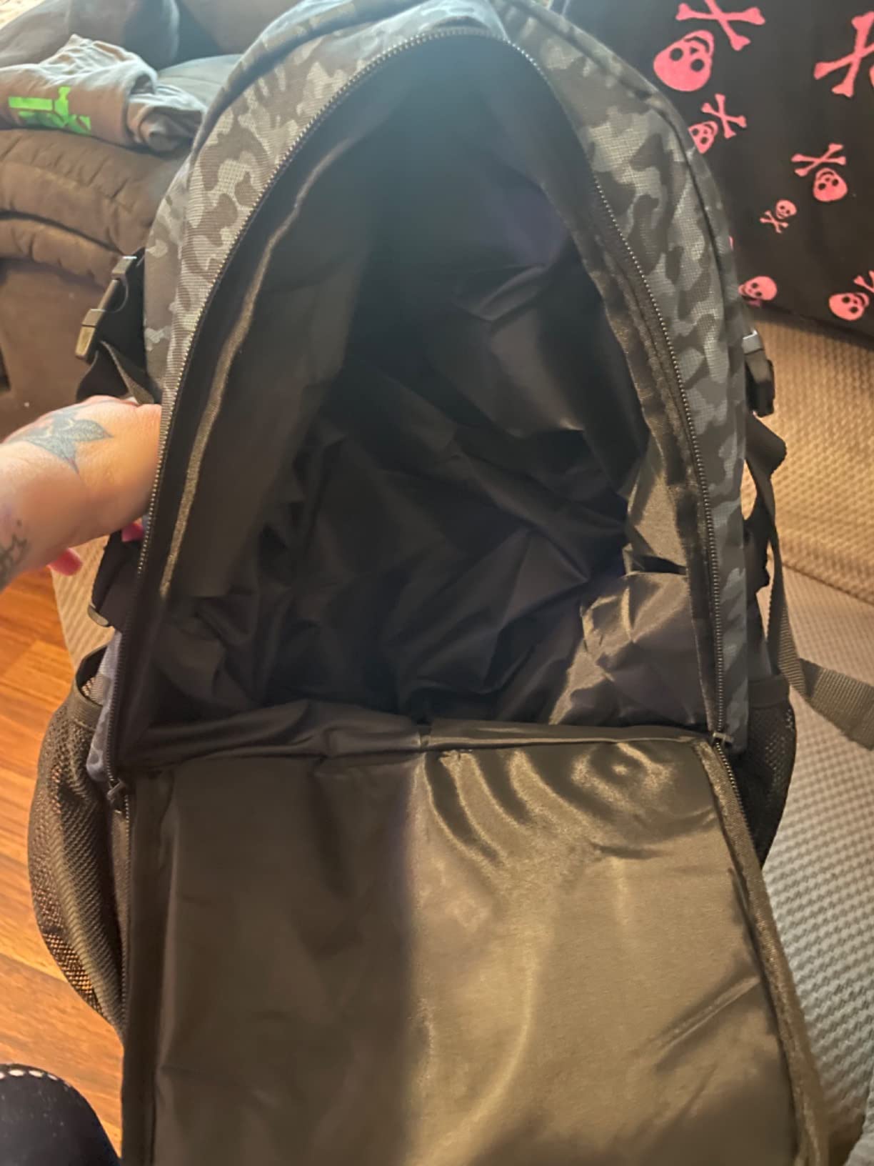 WOLT Basketball Backpack quality construction detail showing stitching, zippers, and material finish after six weeks of use