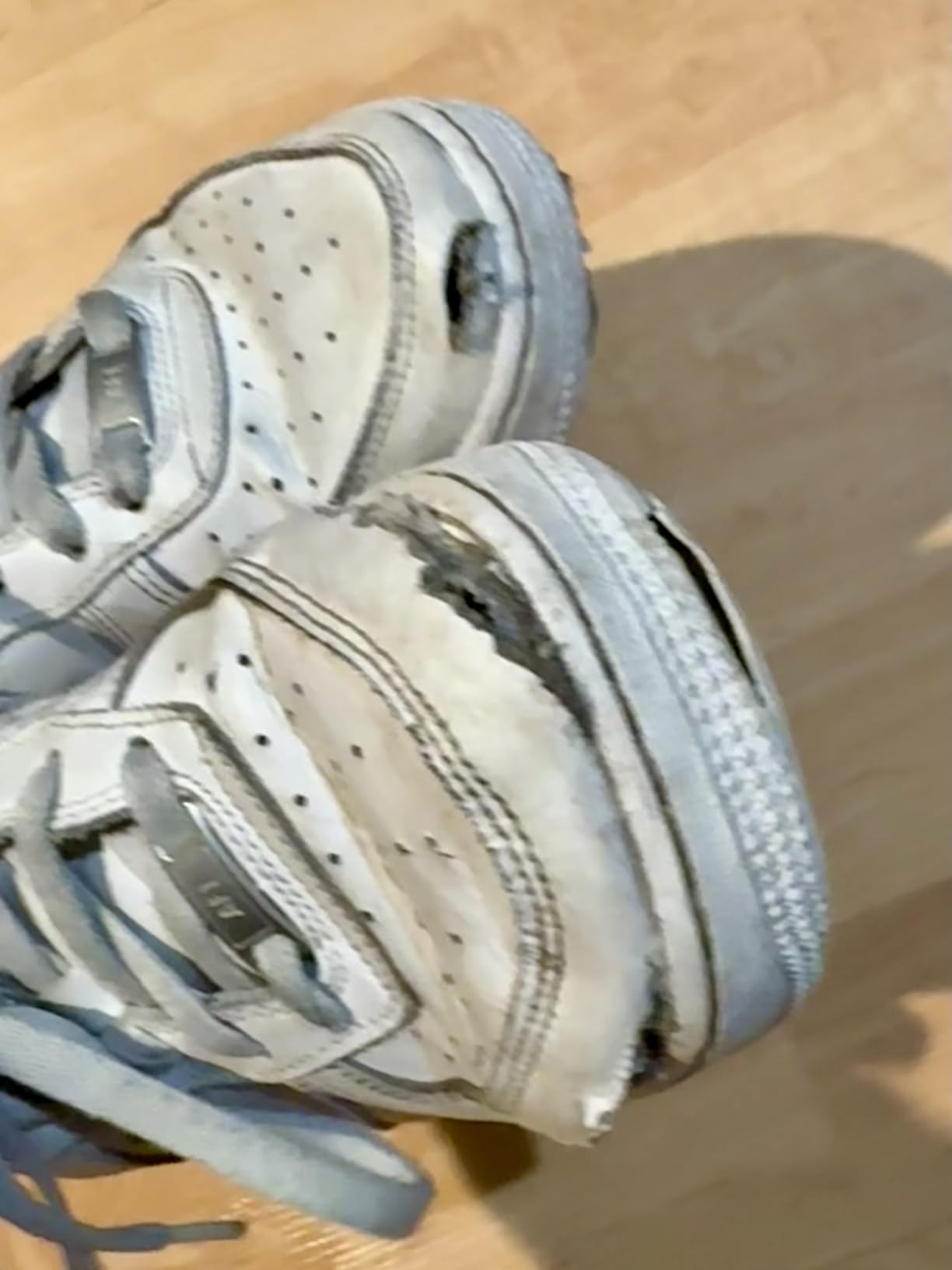Nike Men's Basketball Shoes in white leather showing classic Air Force 1 design with EVA foam midsole