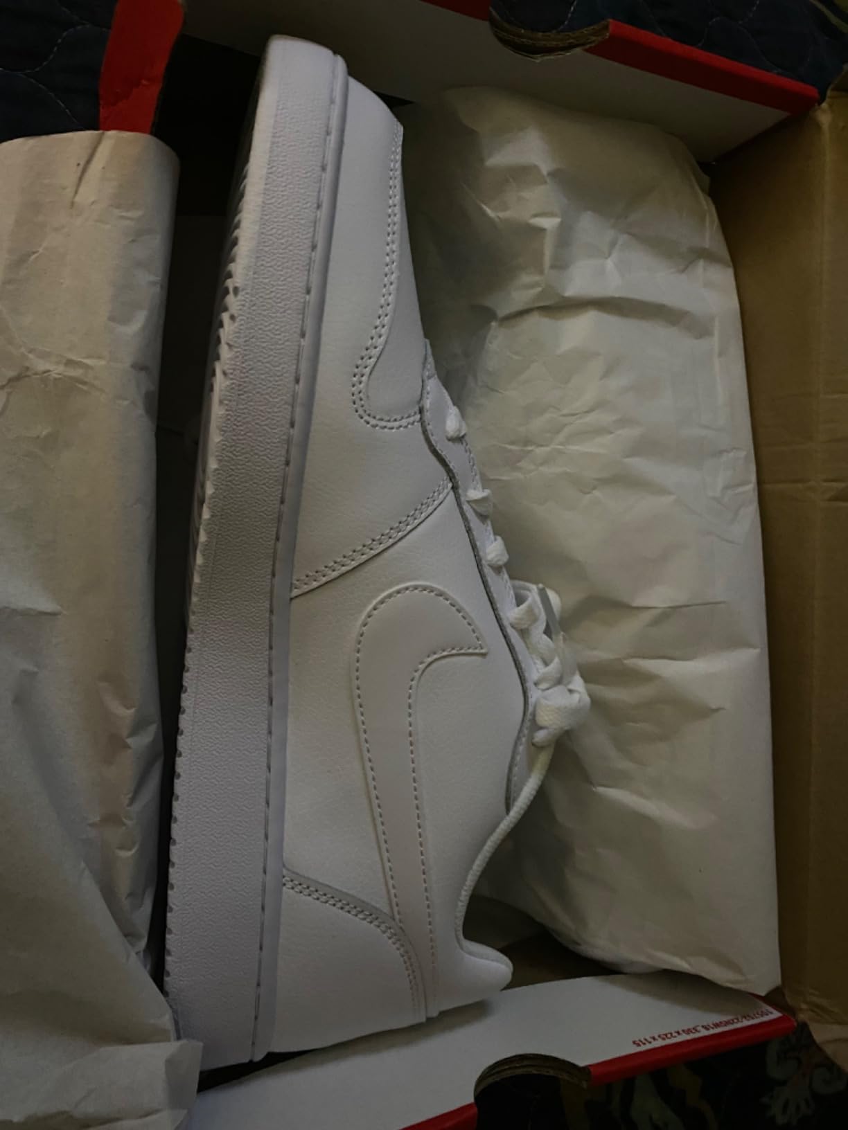 Nike Ebernon Low basketball shoe in White Black Wolf Grey colorway showing classic 80s retro design and leather upper