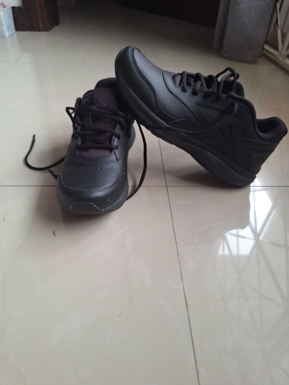 Reebok DMX walking shoes on young person showing comfort and fit for active lifestyle