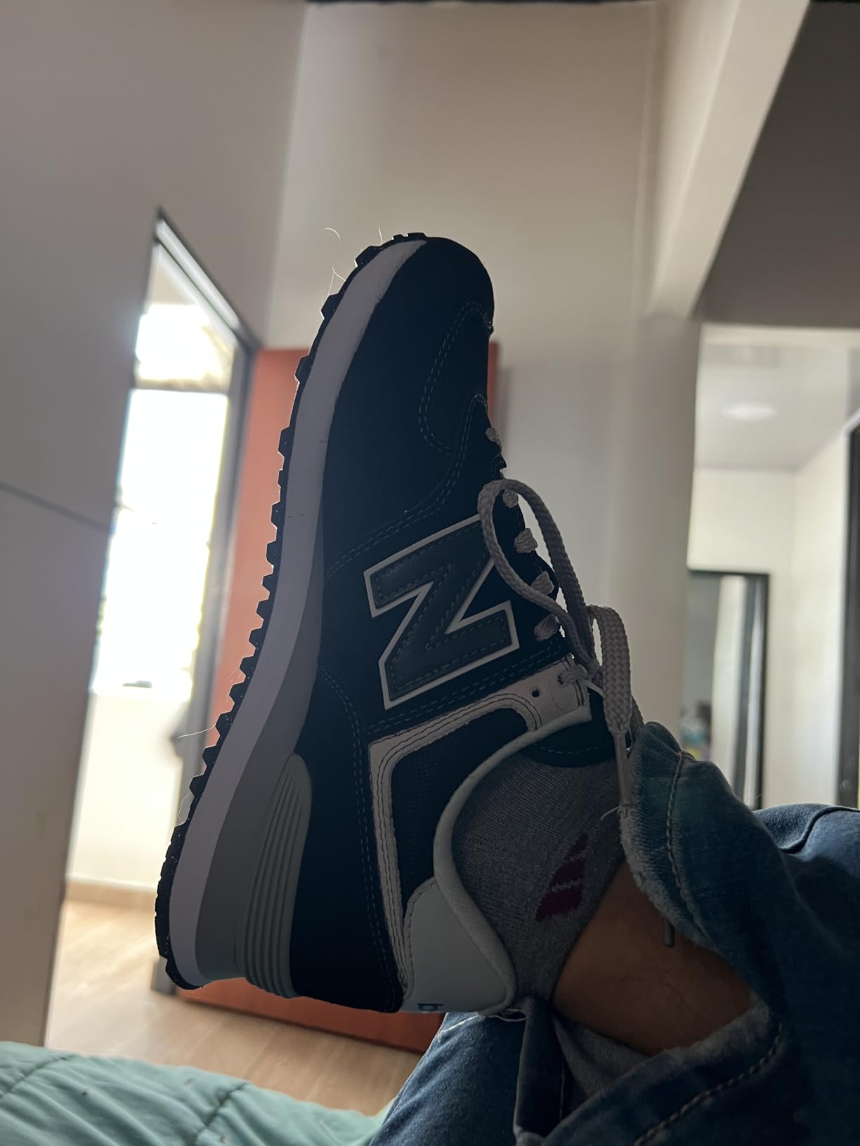 New Balance 574 Core detail showing mesh upper construction and classic N logo branding