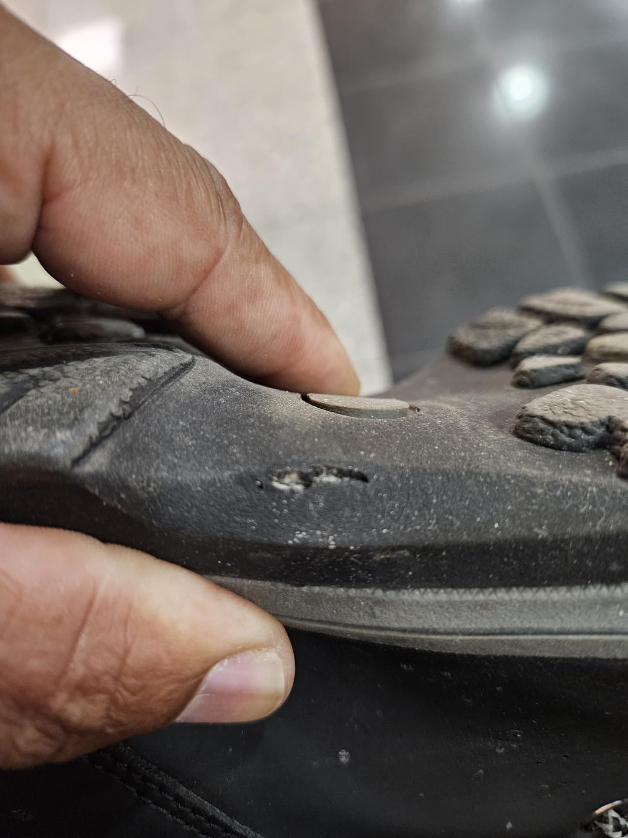 CARENURSE boot sole showing wear patterns and stress points after extended wet terrain testing