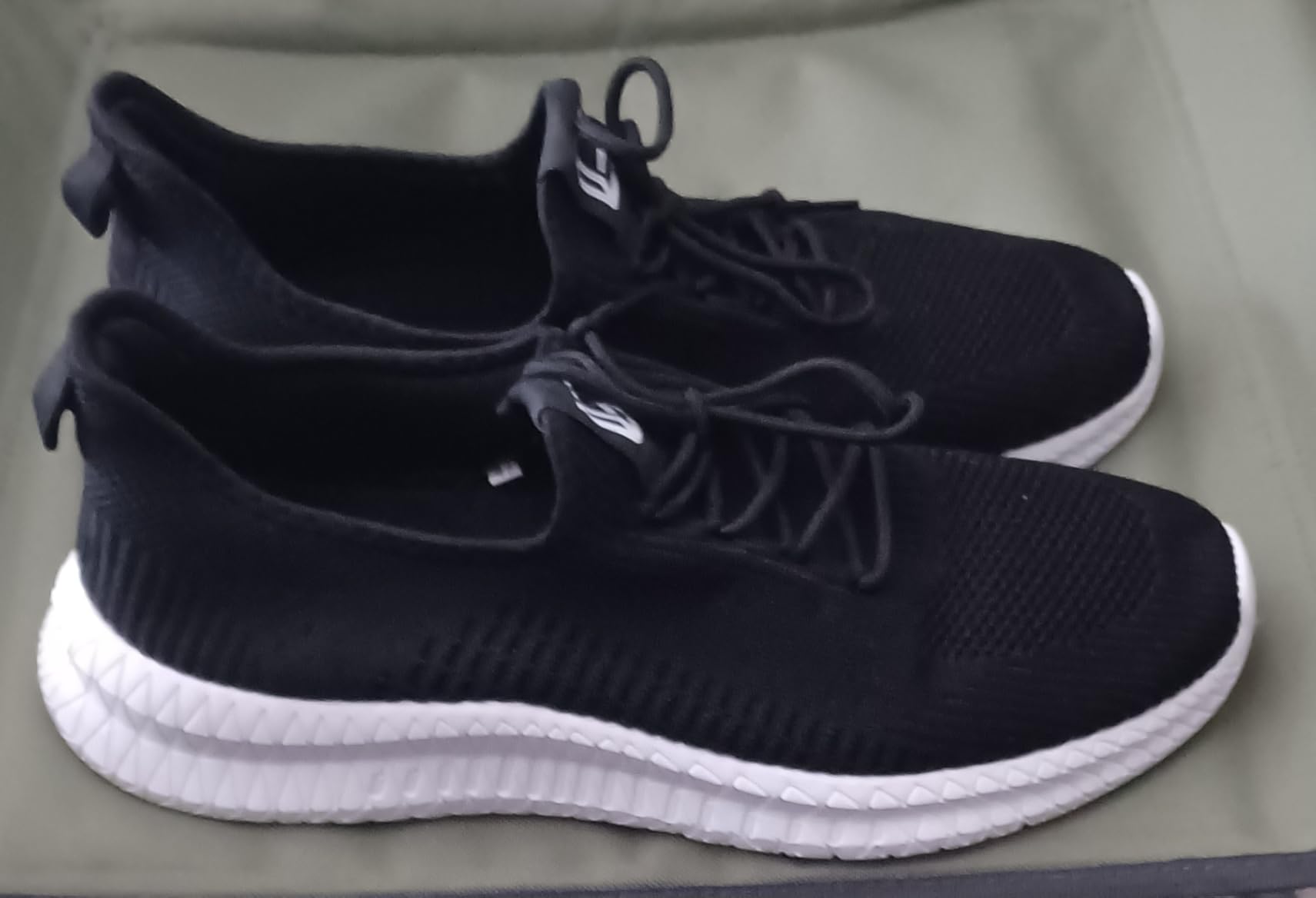 Multiple angle views of LCGJR men's sneakers showing construction details and design features