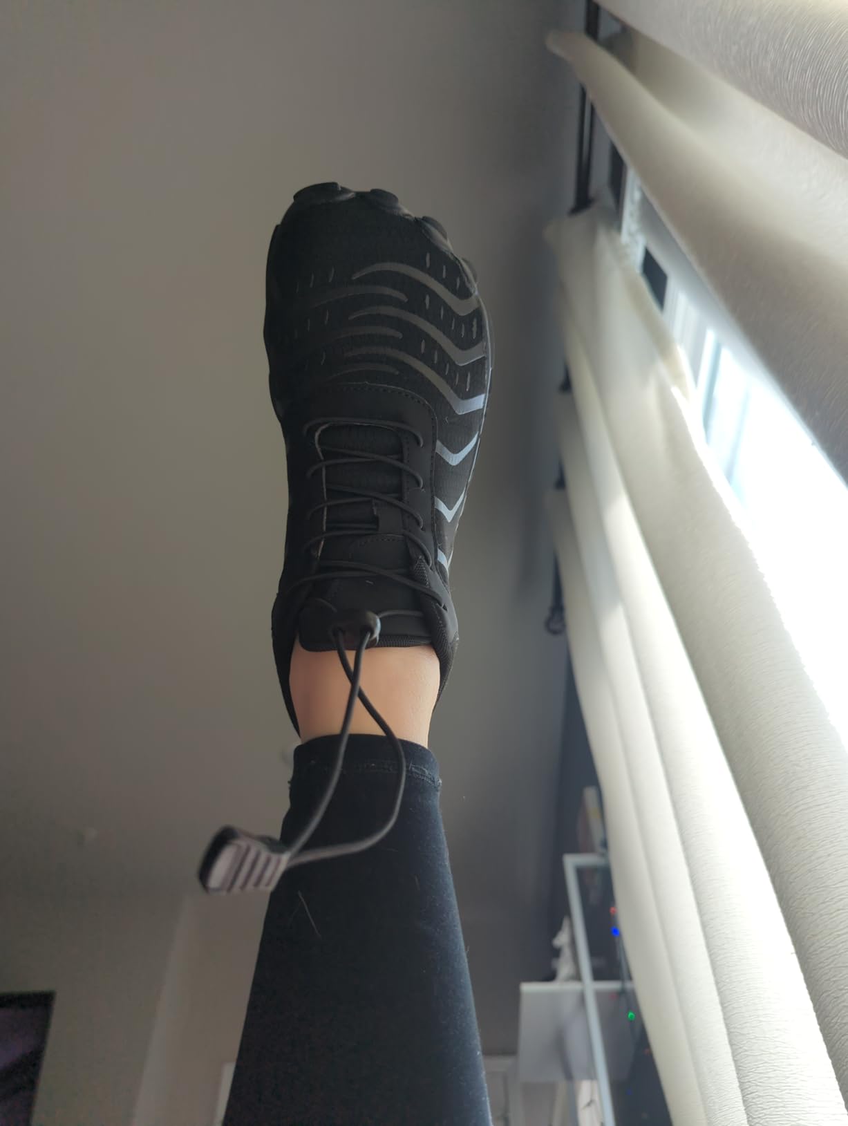 MIFAWA Barefoot Shoes on feet showing natural toe spread and ground contact