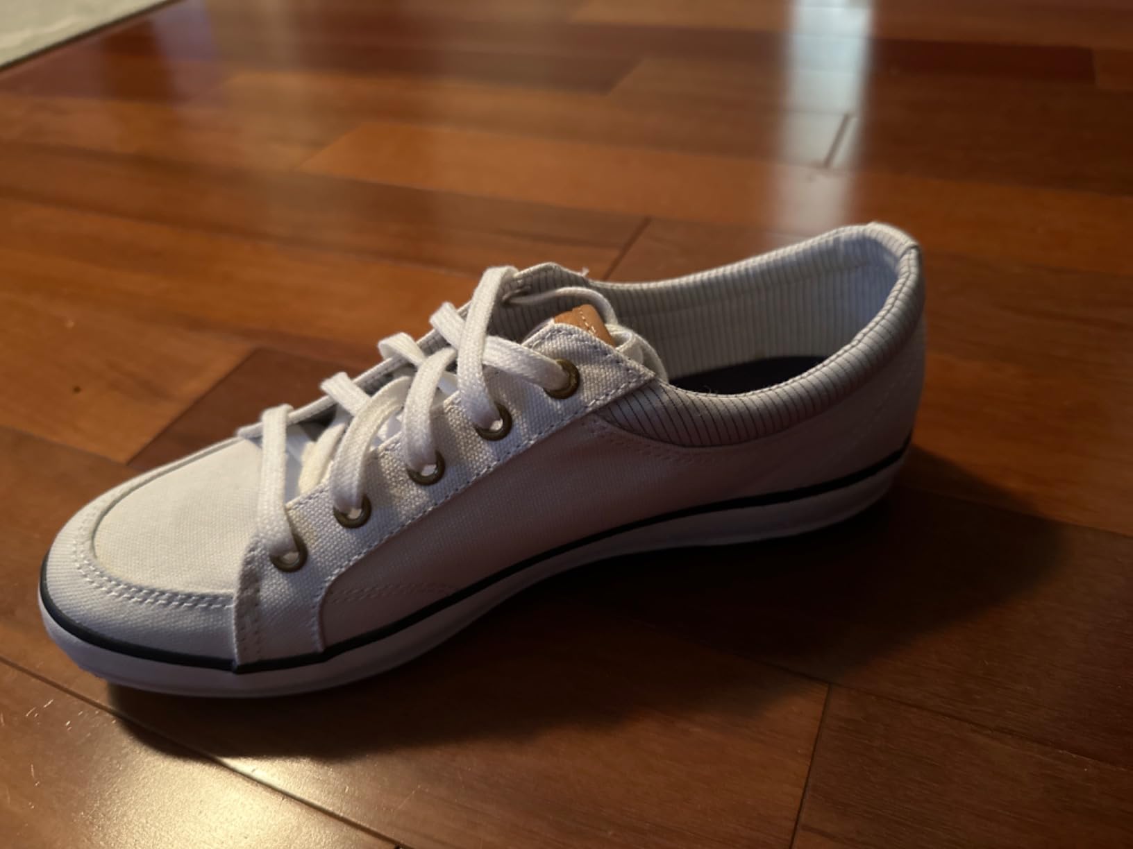 Keds Center sneaker material comparison showing difference between leather and canvas construction variants