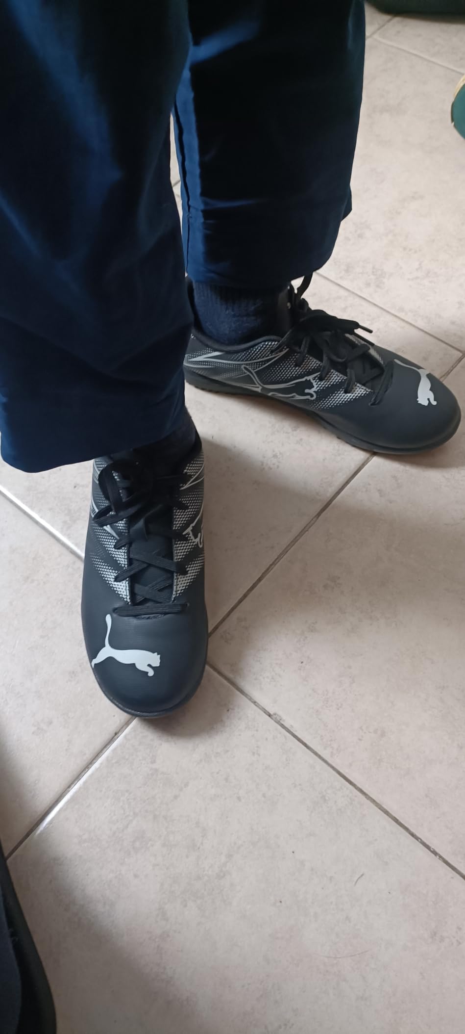 PUMA Attacanto in action showing wear patterns after months of intensive use